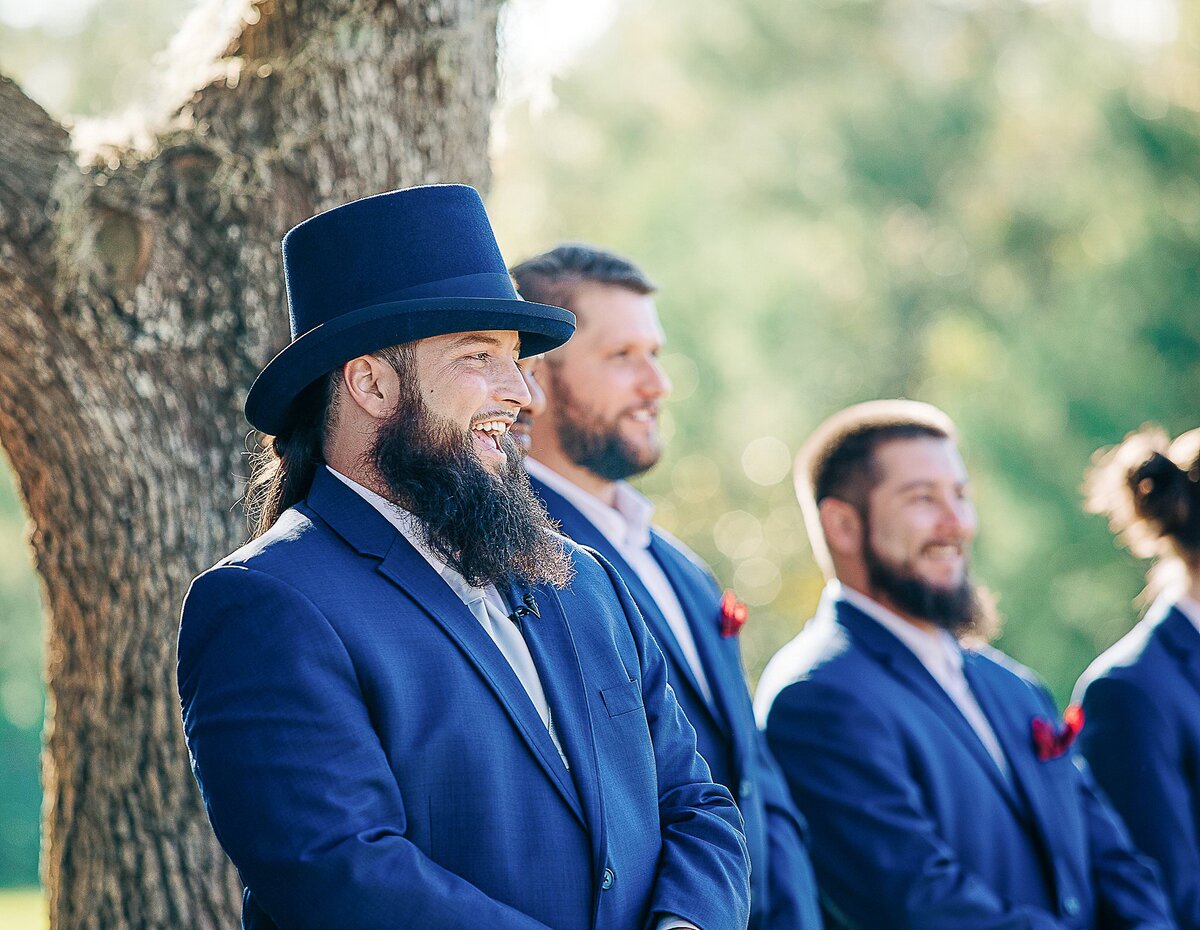 Top hat groom reacts to Bride at Bending Branch Ranch