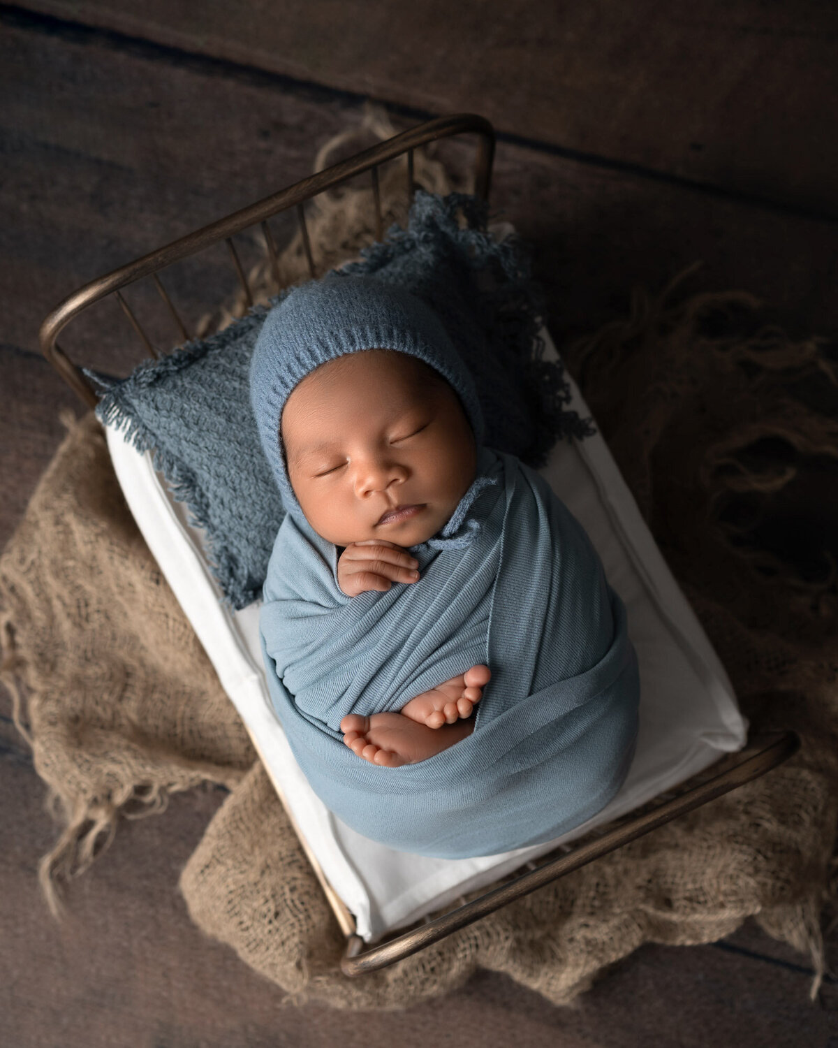 Newborn baby boy blue wrap wooden crate Liberty Hill photographer