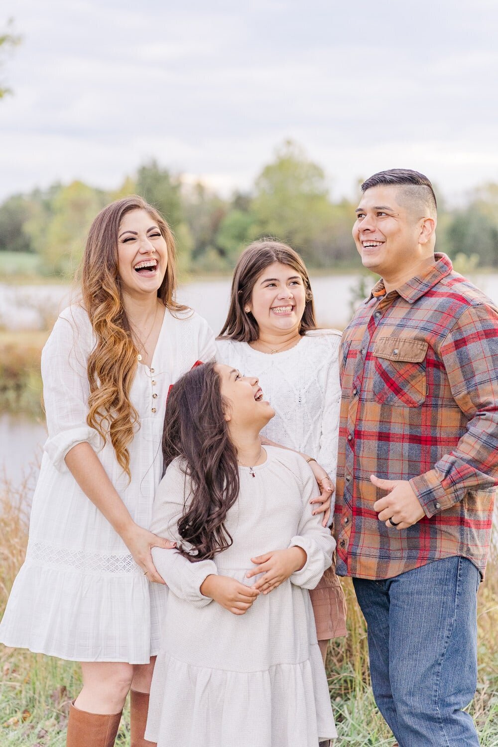family of 4 laughing taken by a Haymarket, Virginia family photographer