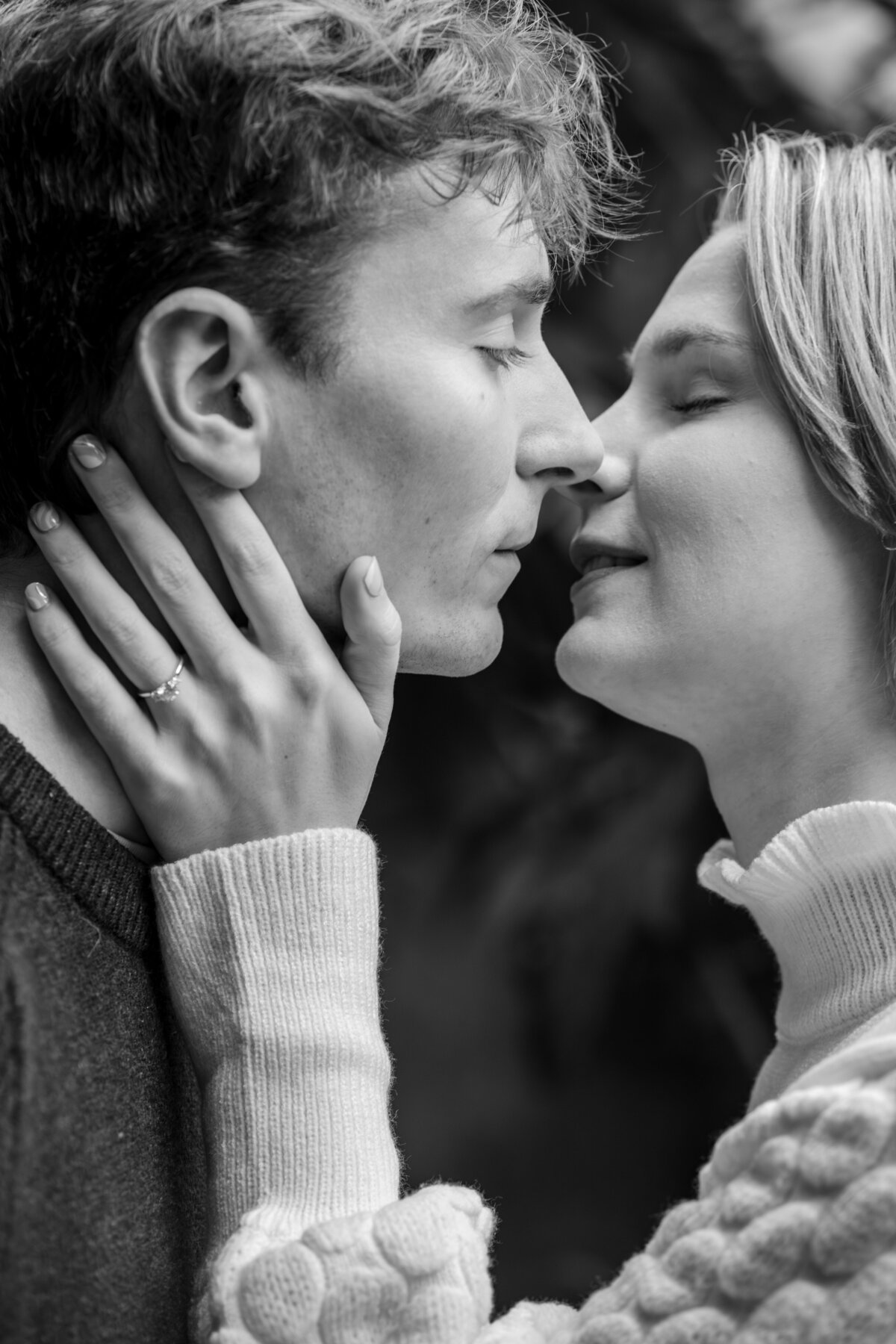 A portrait of an engaged couple about to kiss during their engagement session; taken by columbus wedding photographer A James Visuals.