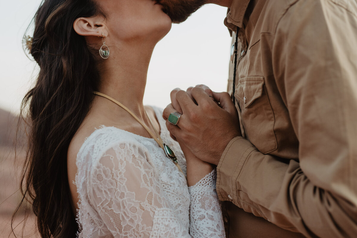 Utah Elopement Photographer captures couple holding hands during bridal portraits