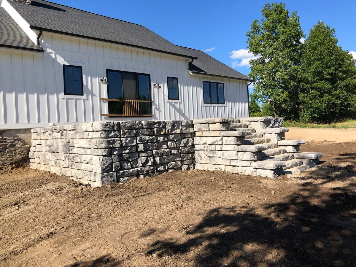 corner-patio-retaining-wall-landscape-grading