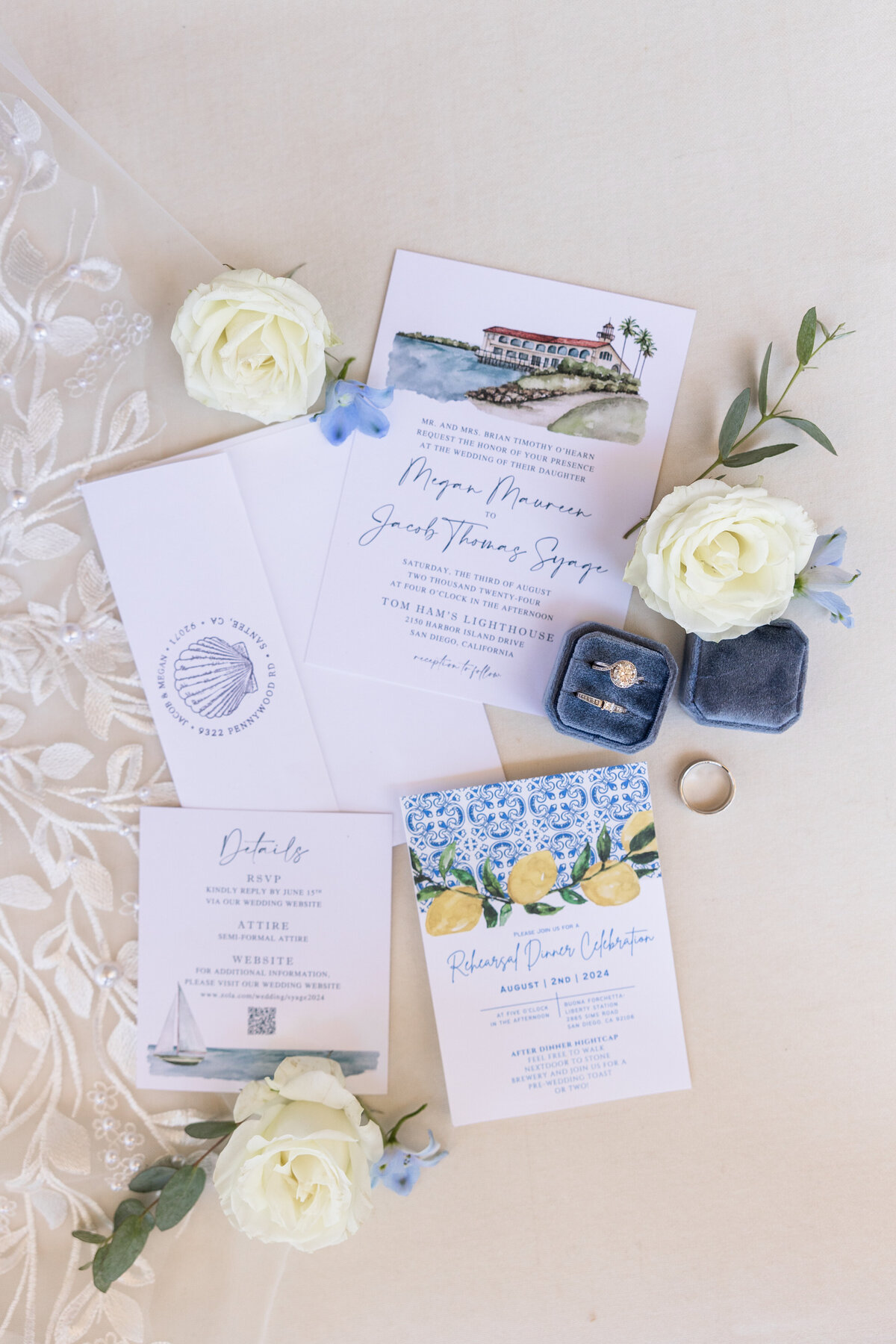 blue and white invitation flatlay