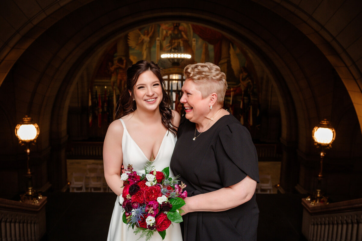 bride and mom photo on the grand staircase at allegheny county courthouse