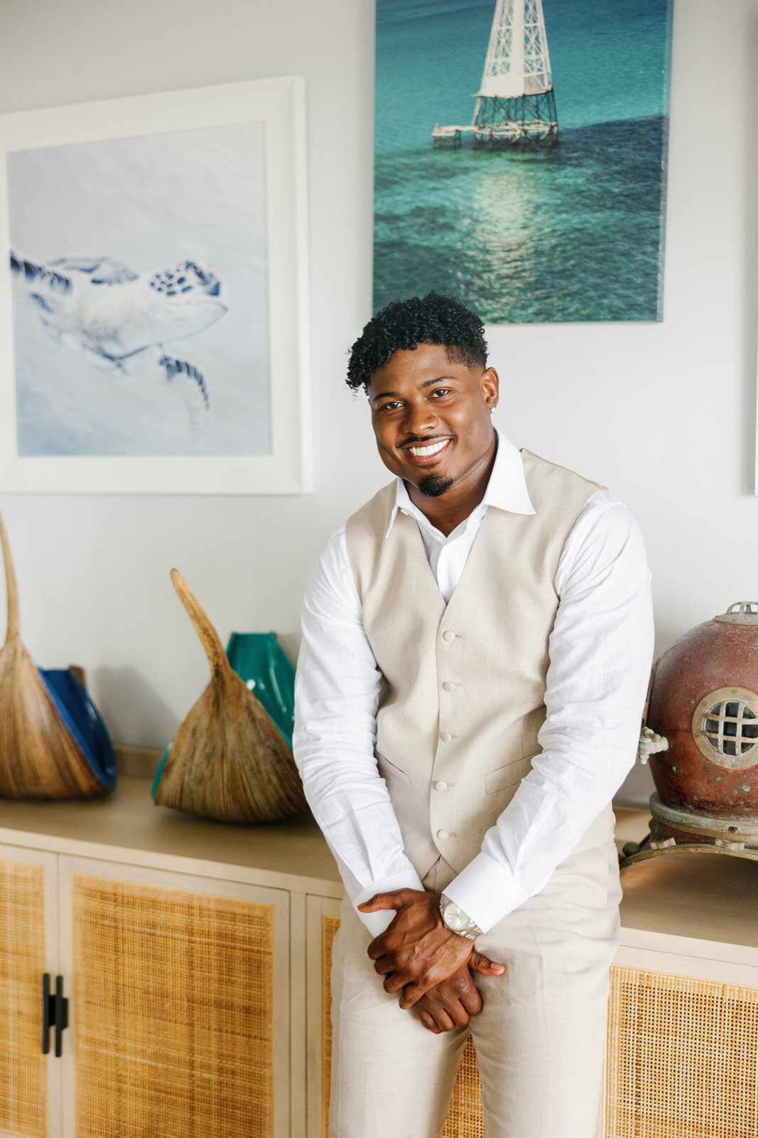 Jonathan sharing a relaxed smile while preparing for his wedding day at Table Key, Islamorada. Photography by Claudia Amalia, Islamorada wedding photographer.