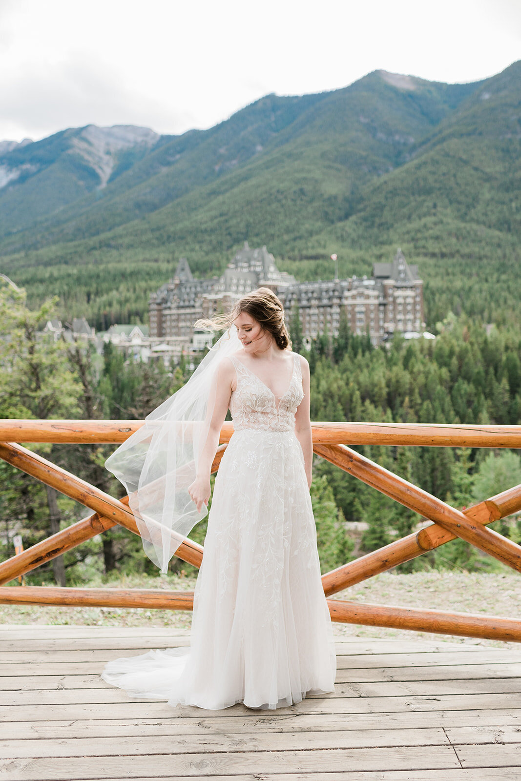 Bridal portrait in front of rocky mountains