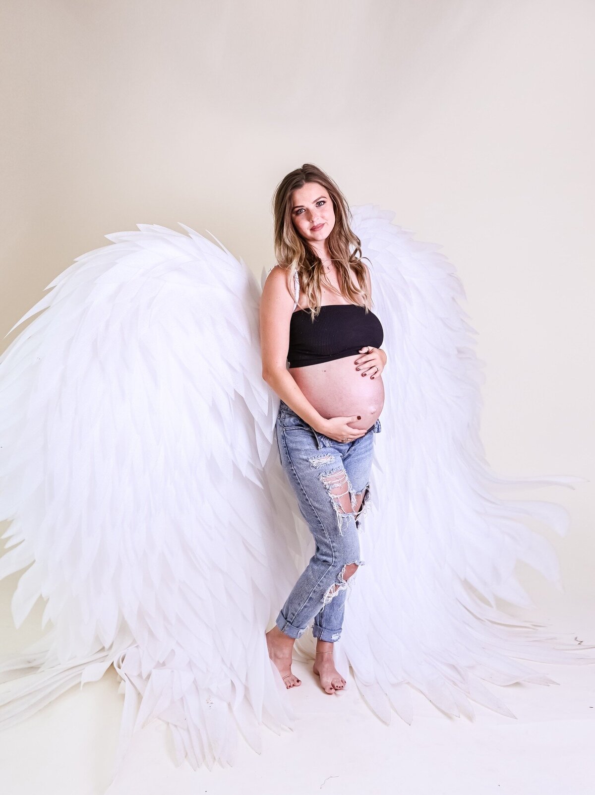 Studio with Angel wings Maternity with Natasha Snyder Photography - Portrait Photographer in Houston and Galveston Areas