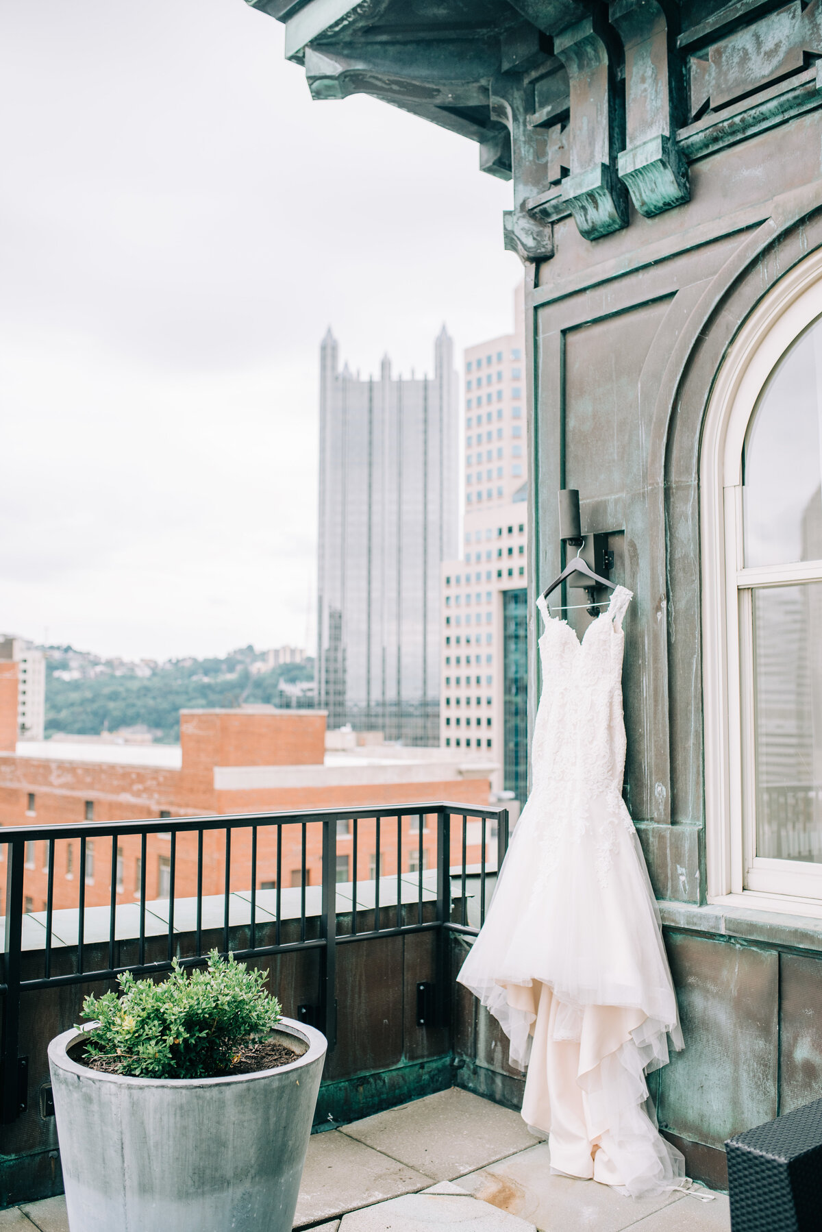 Wedding dress overlooking Pittsburgh skyline