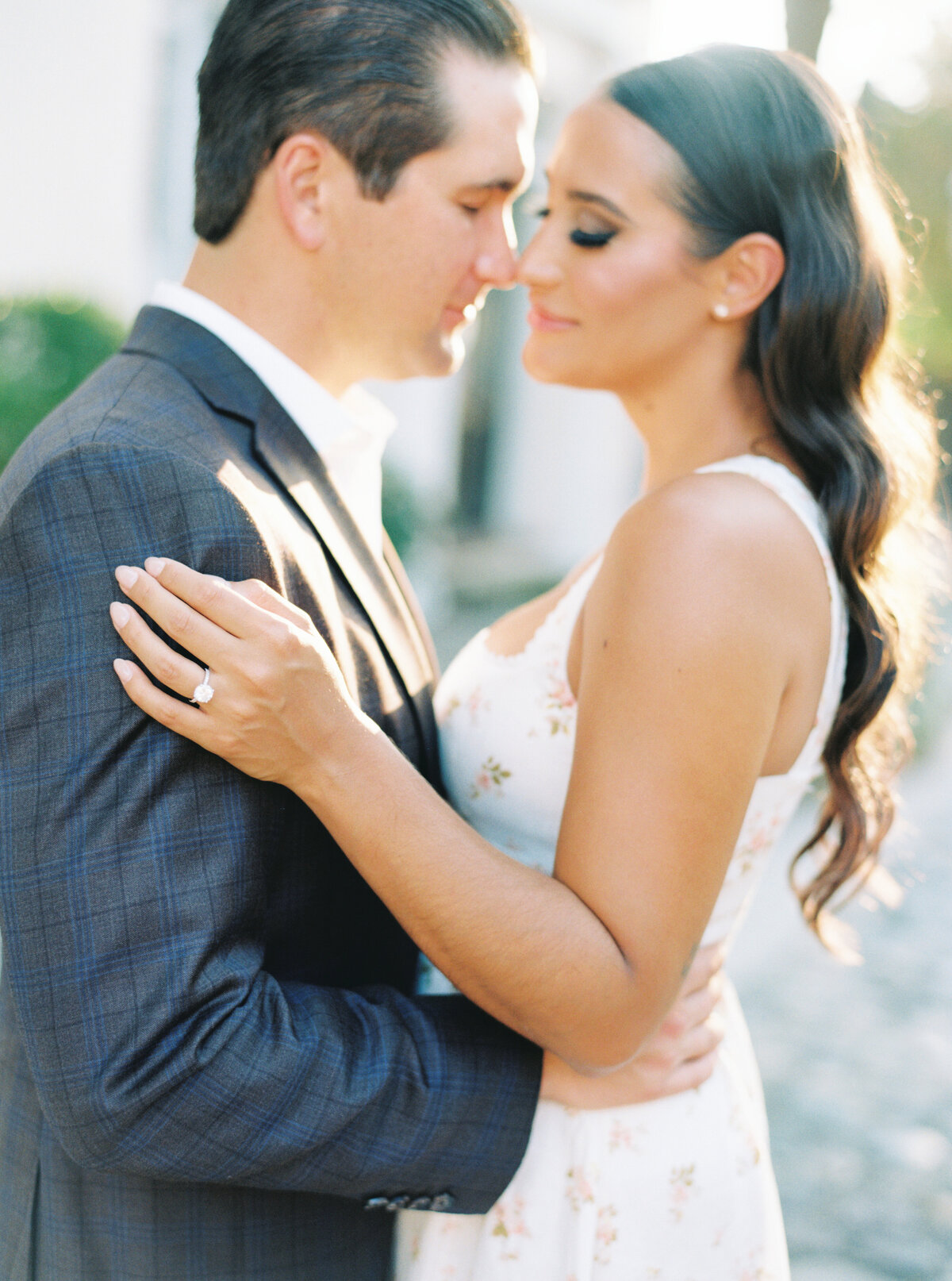 Dreamy golden light in downtown Charleston engagement session.