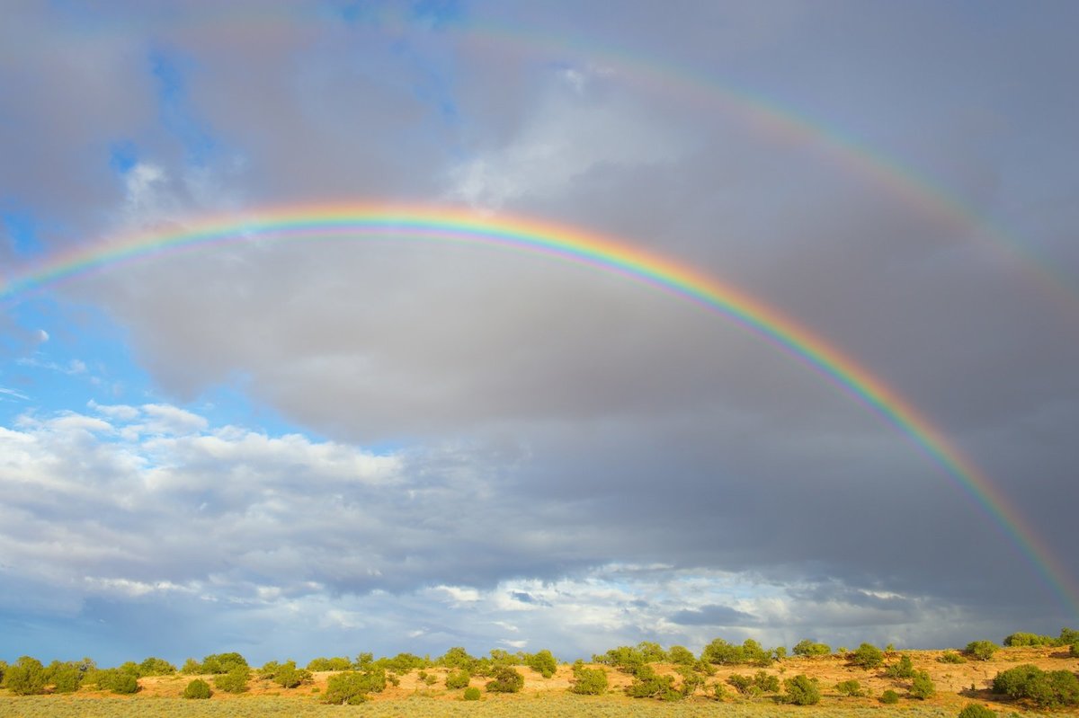 open sky with double rainbow