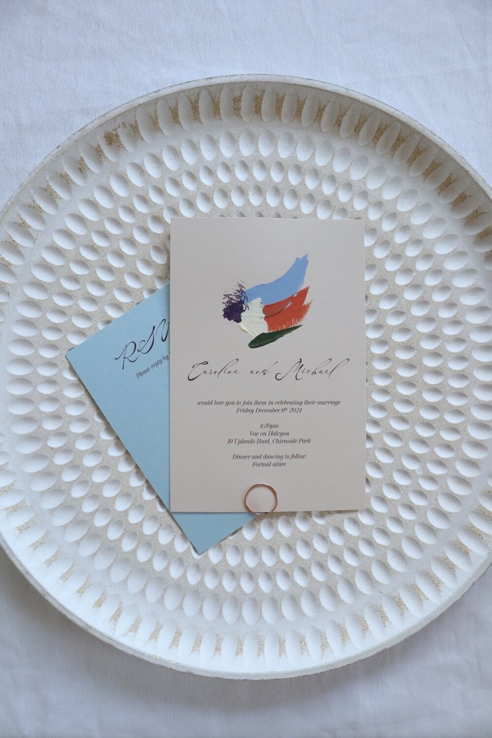Cream-and-blue-painted-wedding-invitations