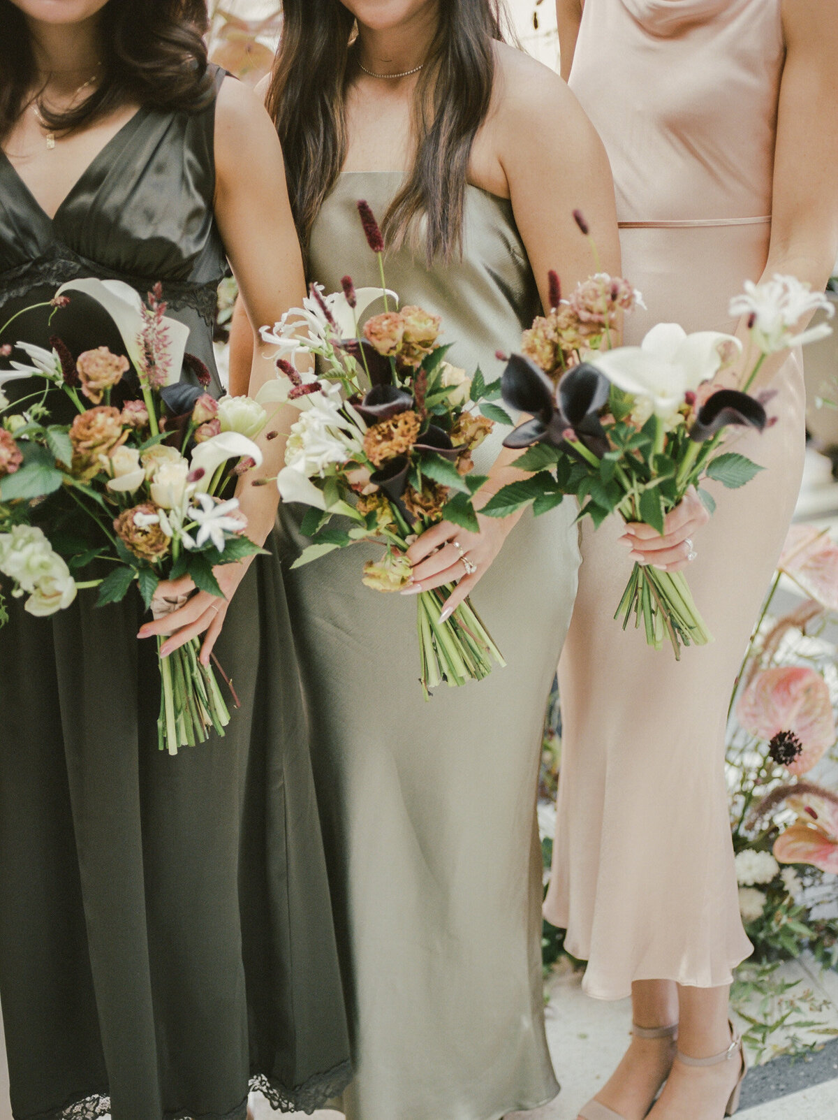 unique, organic fall color palette, fall wedding flowers, different bridesmaids dresses at Shinola Hotel