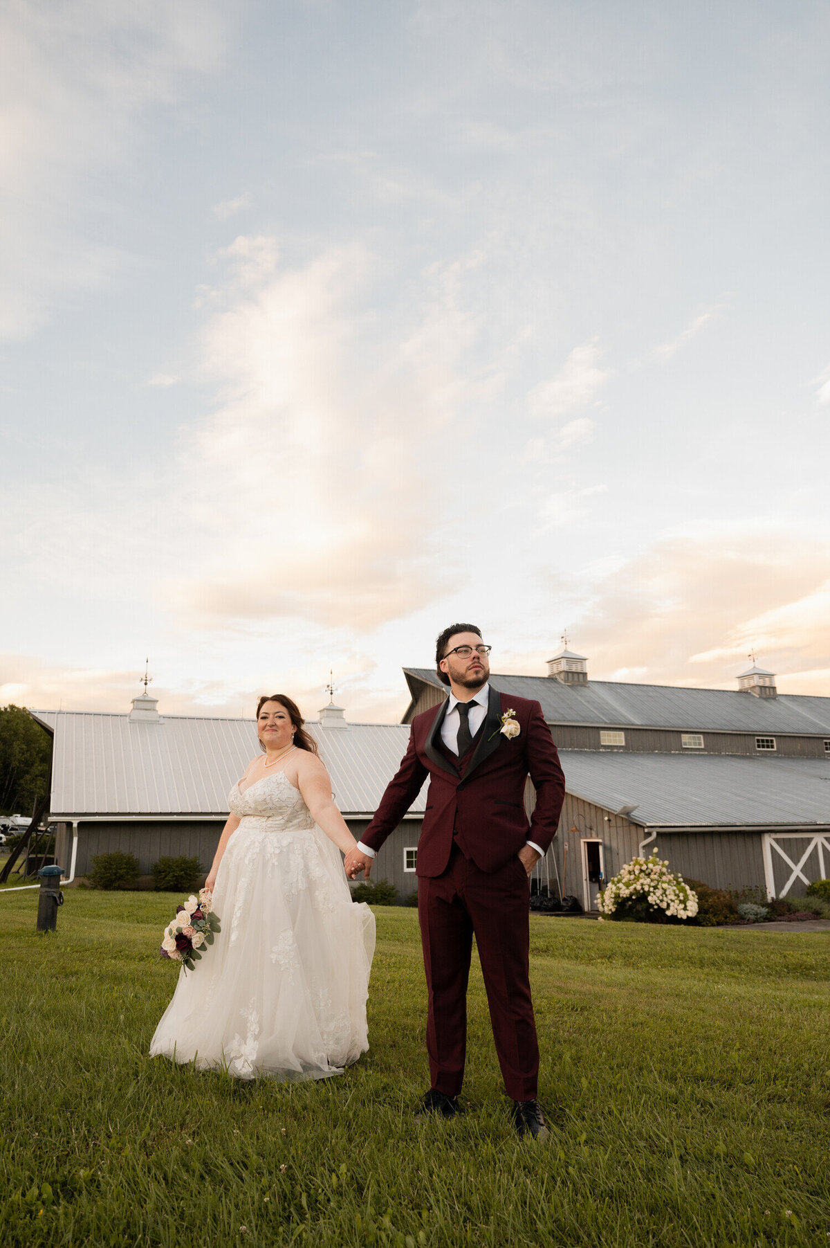A golden hour portrait of the bride and groom during their wedding at the The Barn at Lord Howe in Ticonderoga, NY.