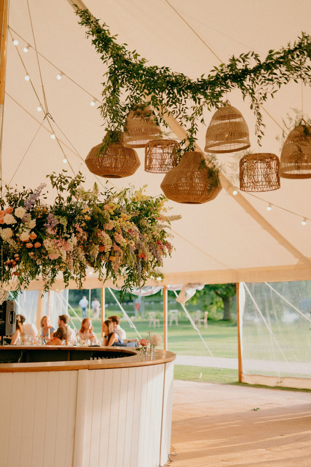 marquee wedding with hanging floral hoop