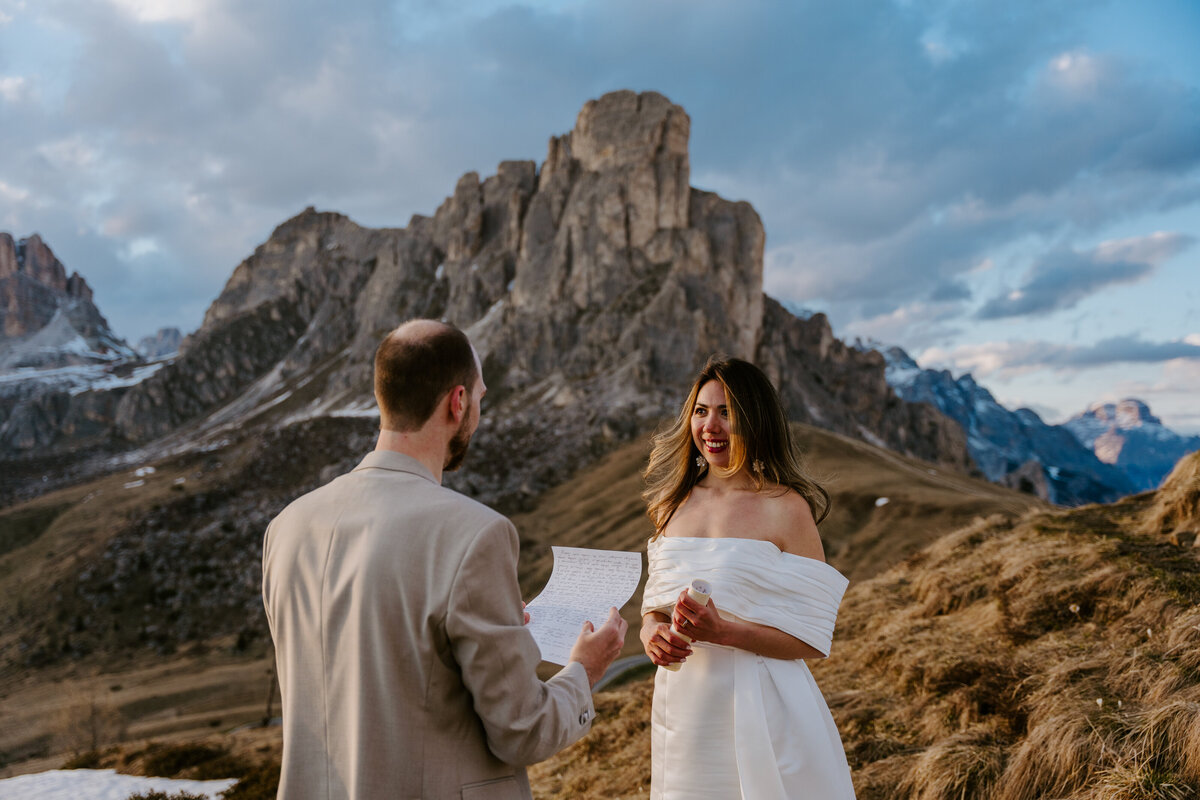 happy couple together in mountain elopement in Dolomites