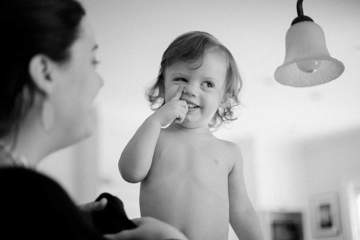 Black-and-White-Portrait-Baby-picking-his-nose-Florida-Documentary-photographer