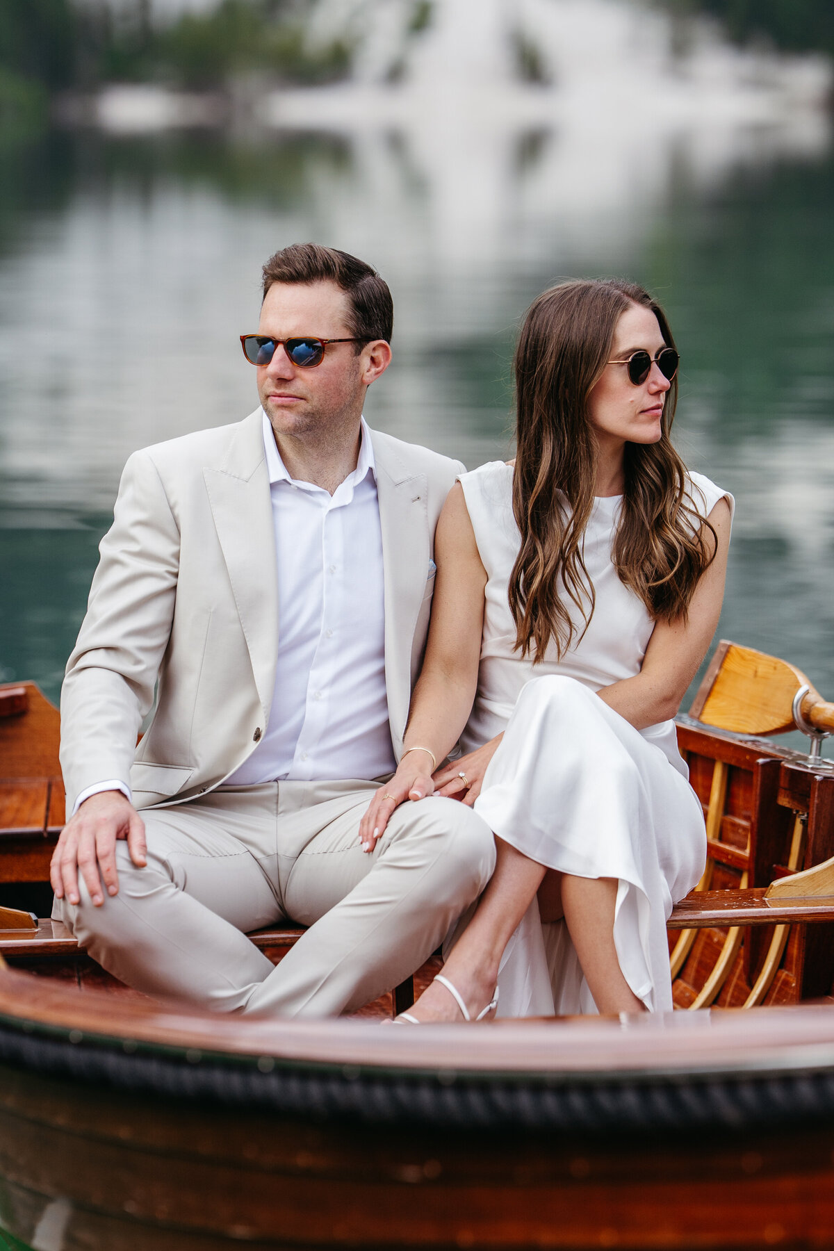 Bride and groom romantic rowboat Lago di Braies