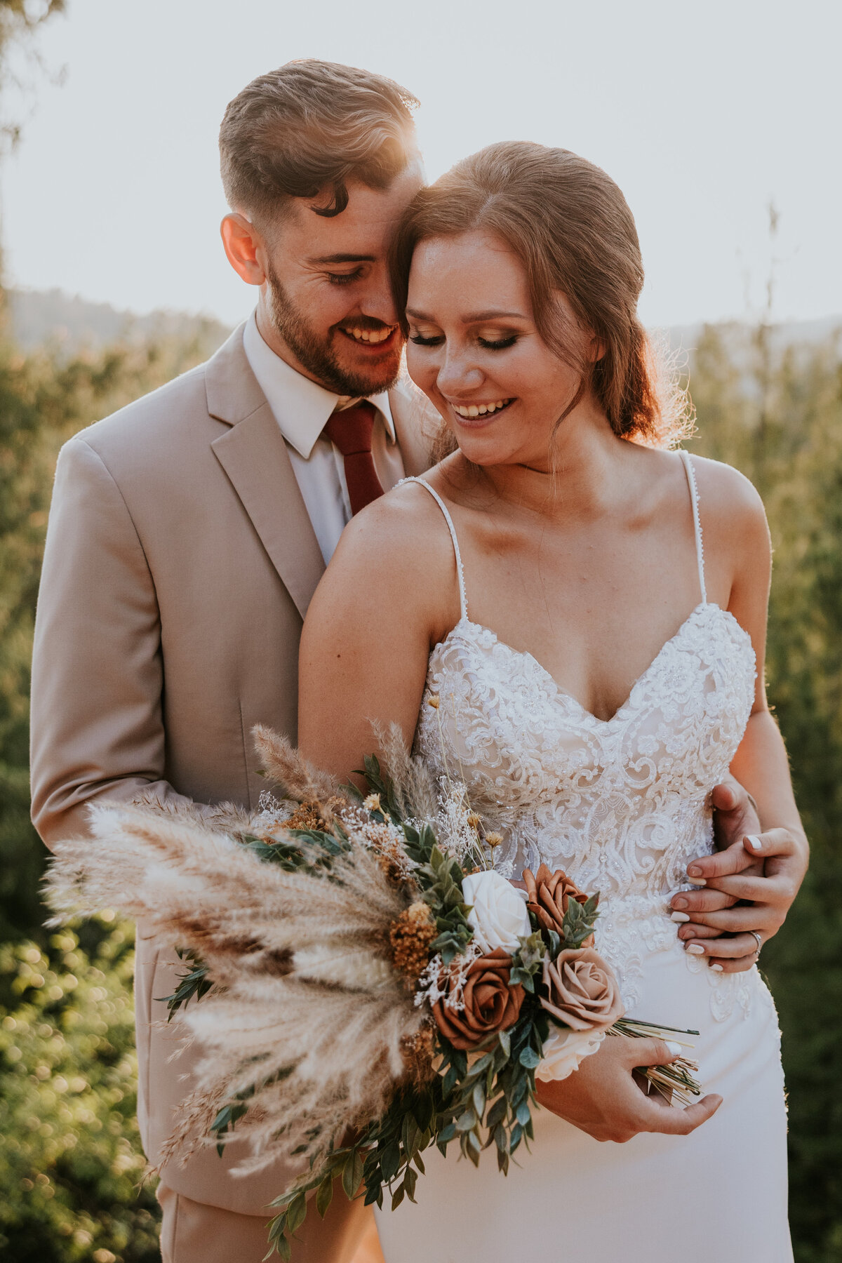 Bride and groom laugh