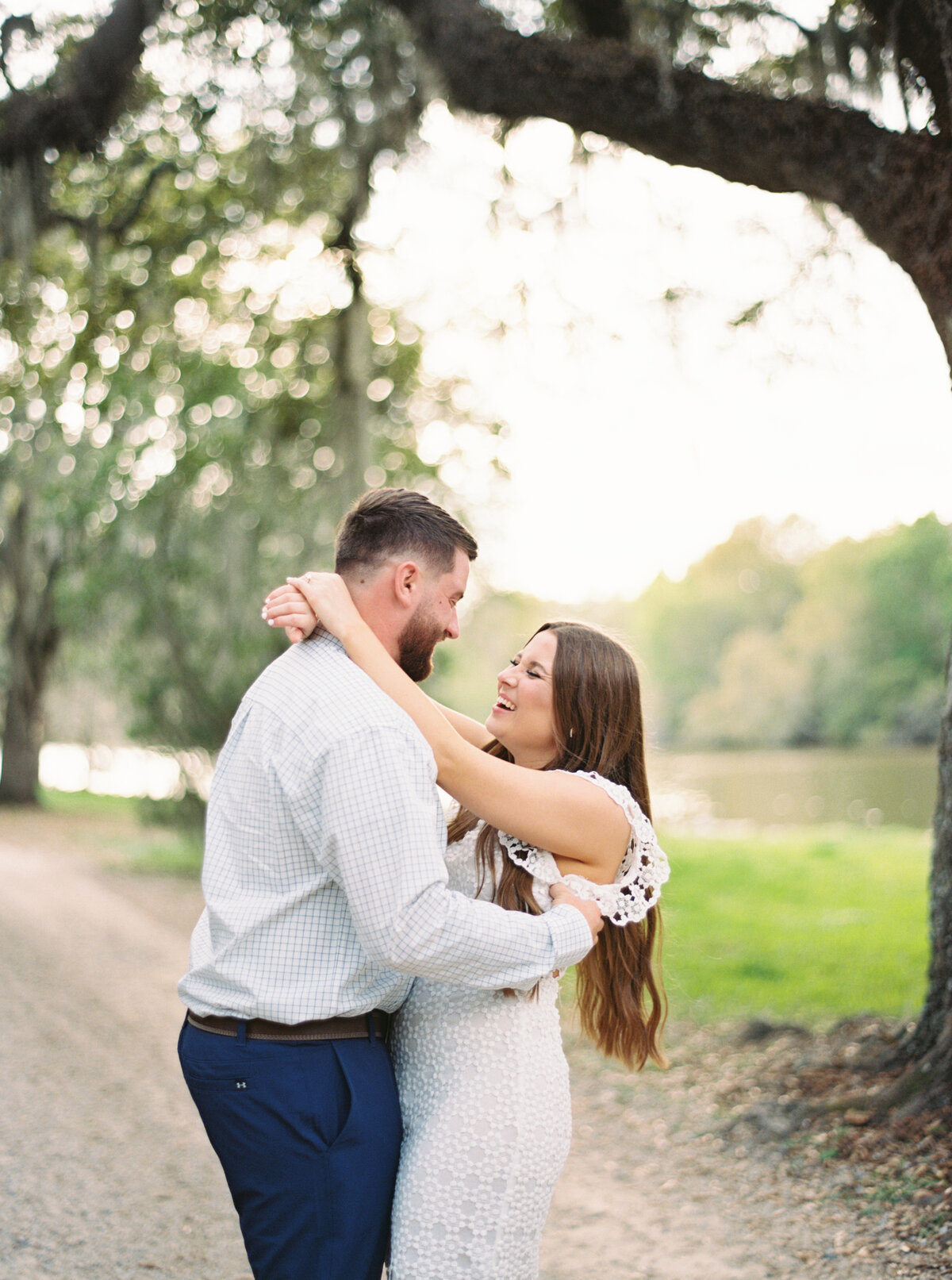 A magical engagement session set amidst the lush greenery of Jungle Gardens, captured with timeless elegance on film by Morgan Alysse, Louisiana film photographer.