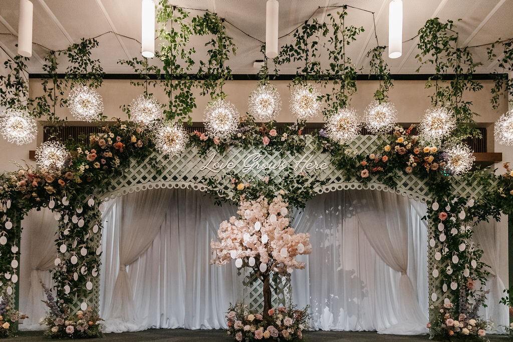 wedding reception entrance with escort cards hanging