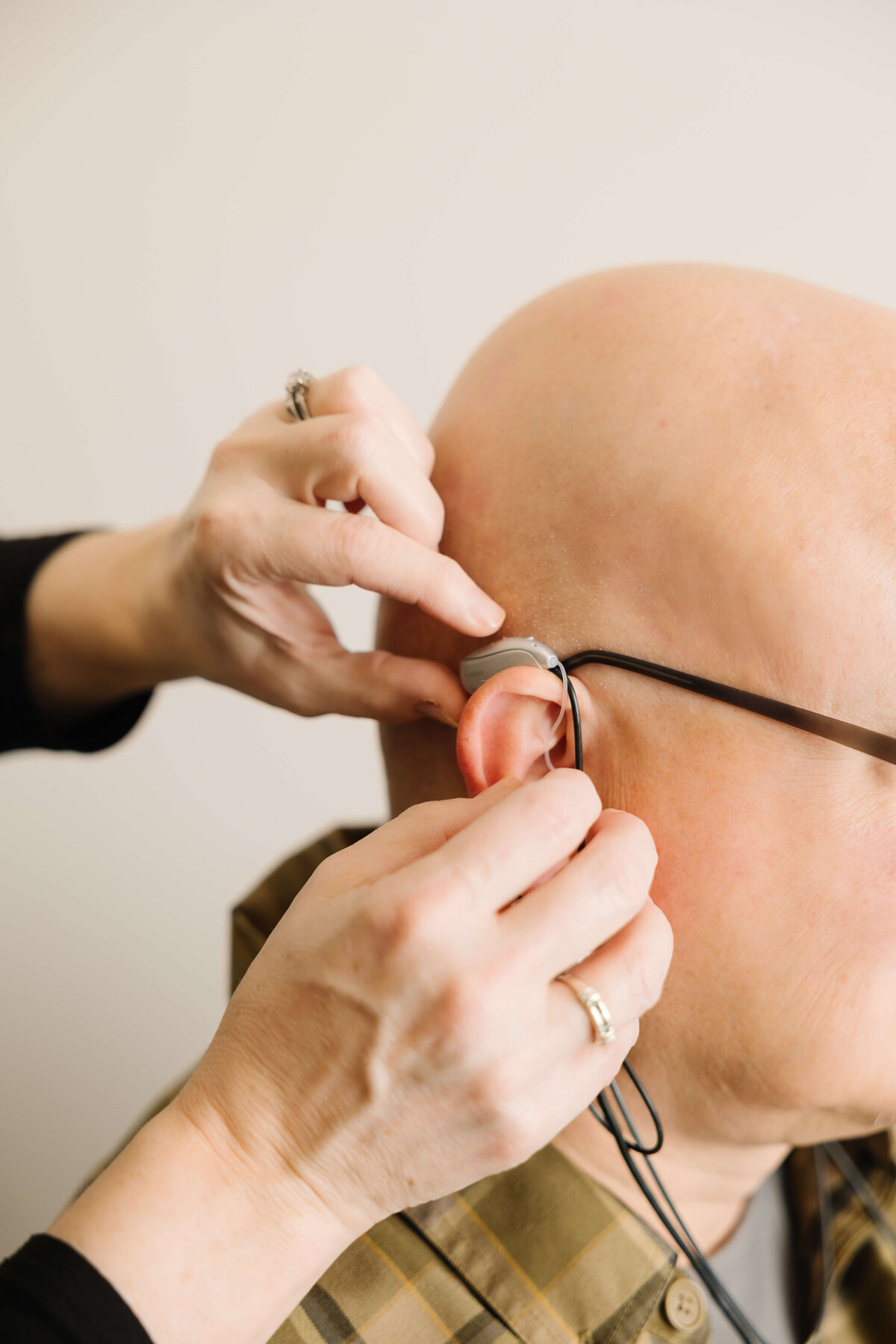 Fitting-hearing-aid-brand-photo-by-idaho-commercial-brand-photographer-erin-moore