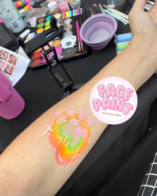 face-painting-by-alyssa-daken-Bemidji-arm-heart-flowers-face-paint-design