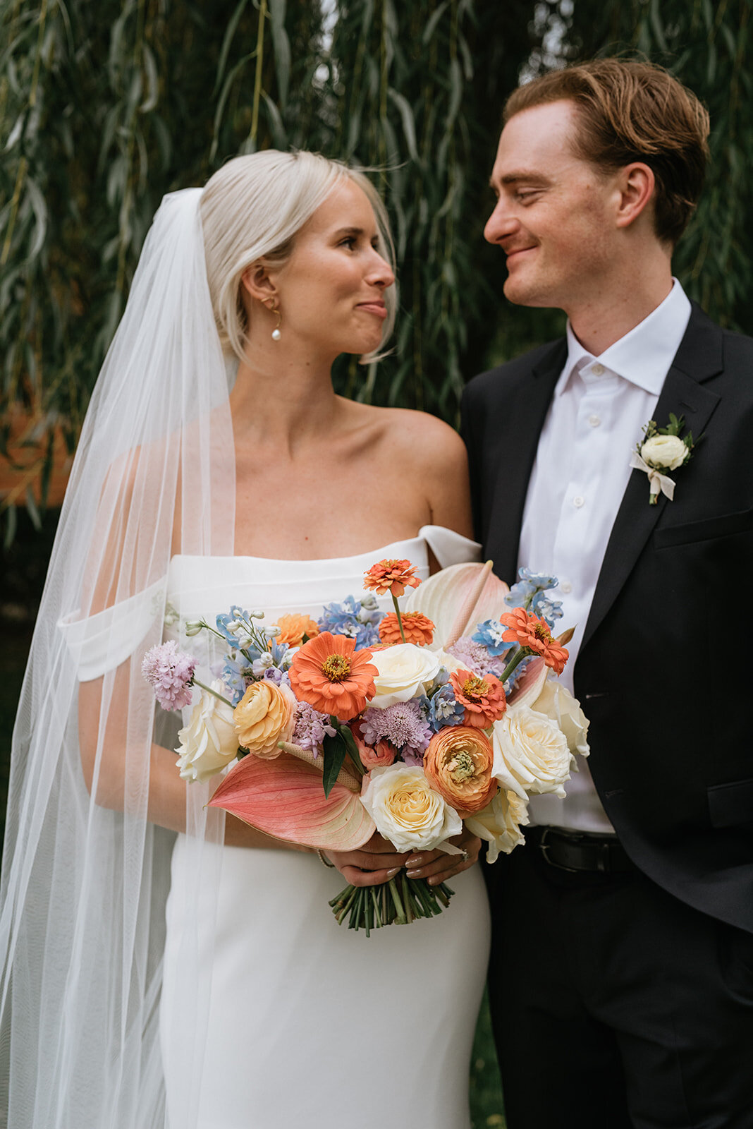 Bold and bright bridal bouquet by The Romantiks, romantic wedding florals based in Calgary, AB & Cranbrook, BC. Featured on the Brontë Bride Vendor Guide.