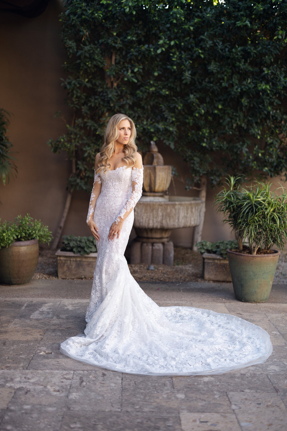 Bride posing for portrait on wedding day at Paradise Valley Country Club