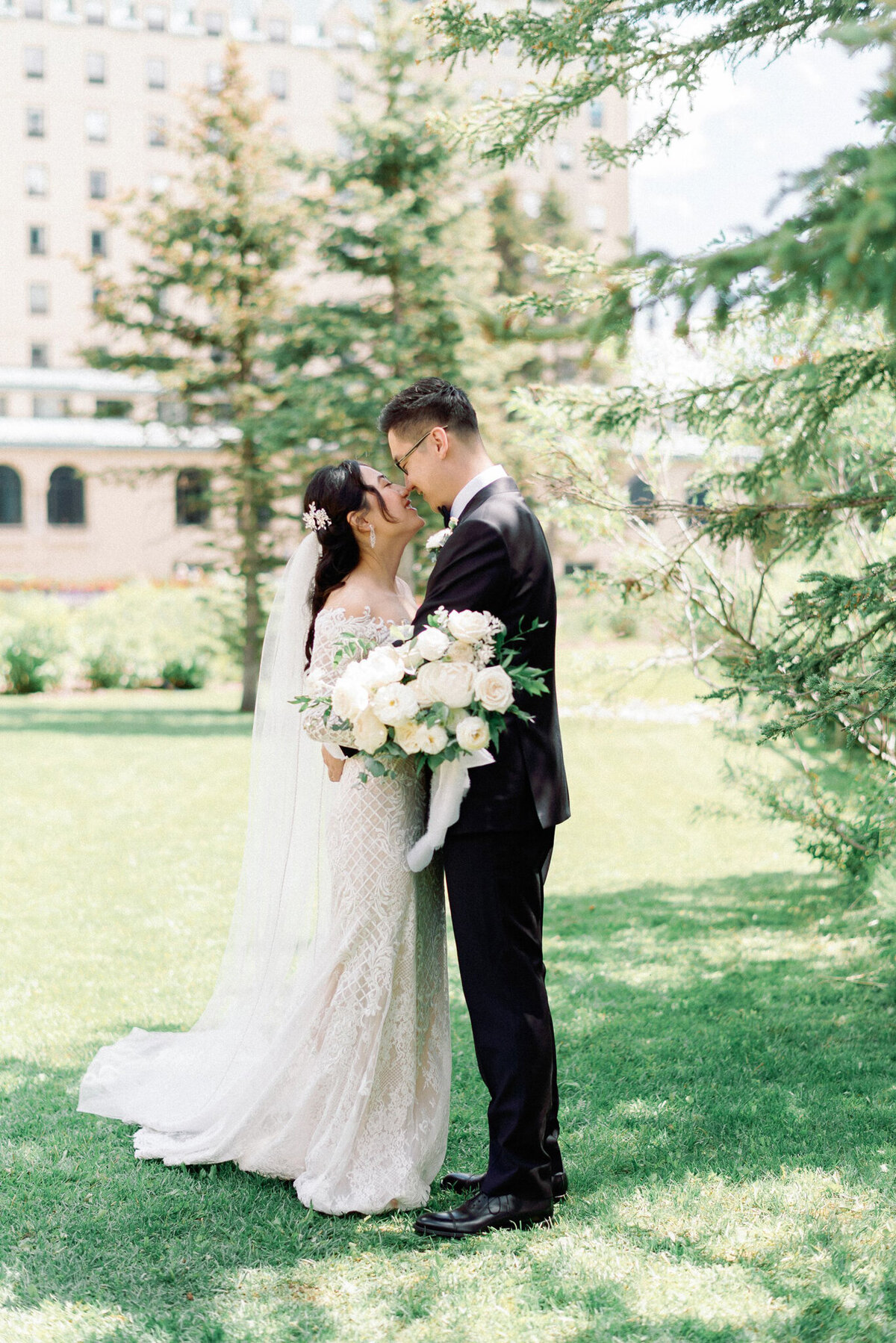Elegant and romantic bride and groom portrait by Kaity Body Photography, elegant film inspired wedding photographer in Calgary, Alberta. Featured on the Bronte Bride Vendor Guide.