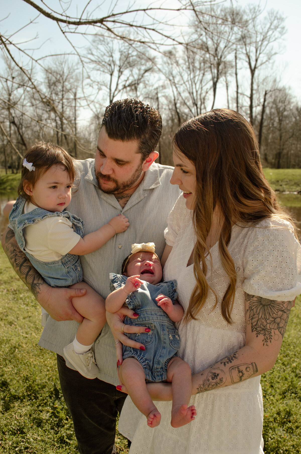 family of 4 poses 