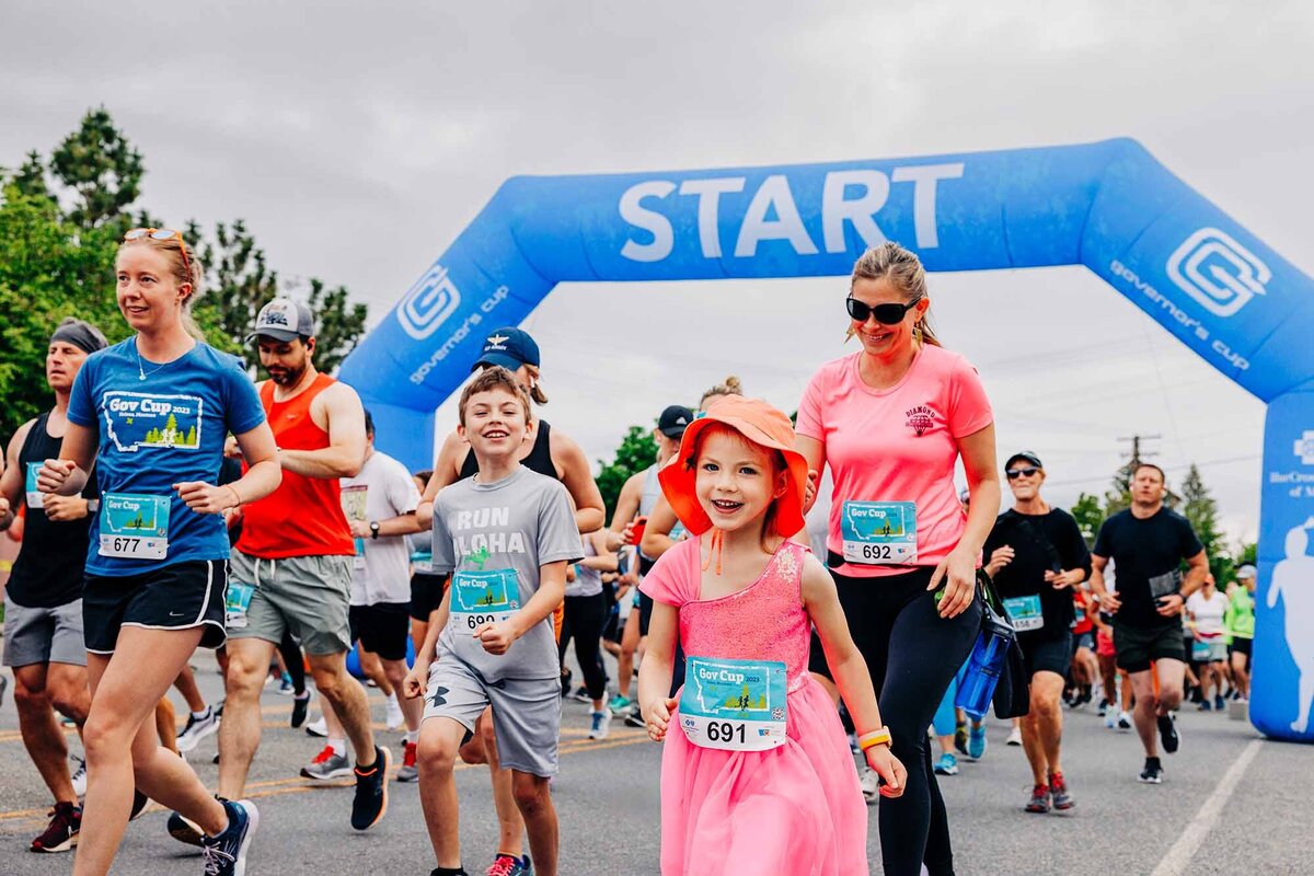 Little girl in pink dress at Governor's Cup Race, Helena, MT