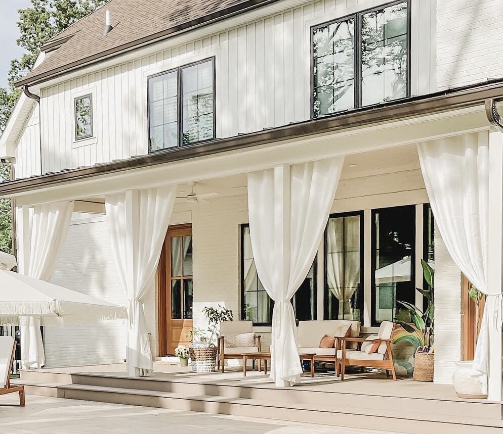 The backyard includes a large deck for relaxing beside the limestone in-ground pool