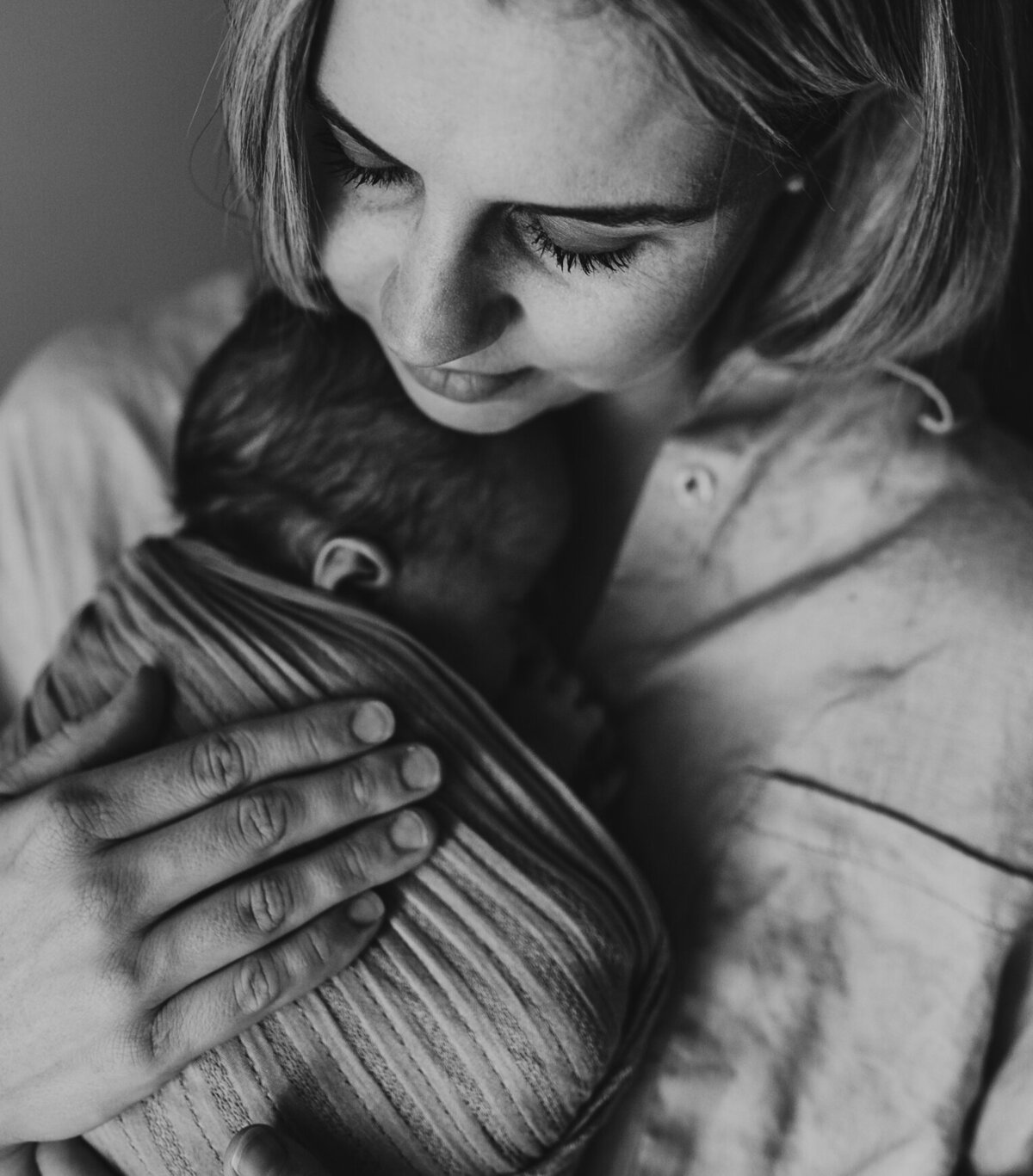 Perth newborn photographer, in studio session  - bub and mum in a beautiful embrace
