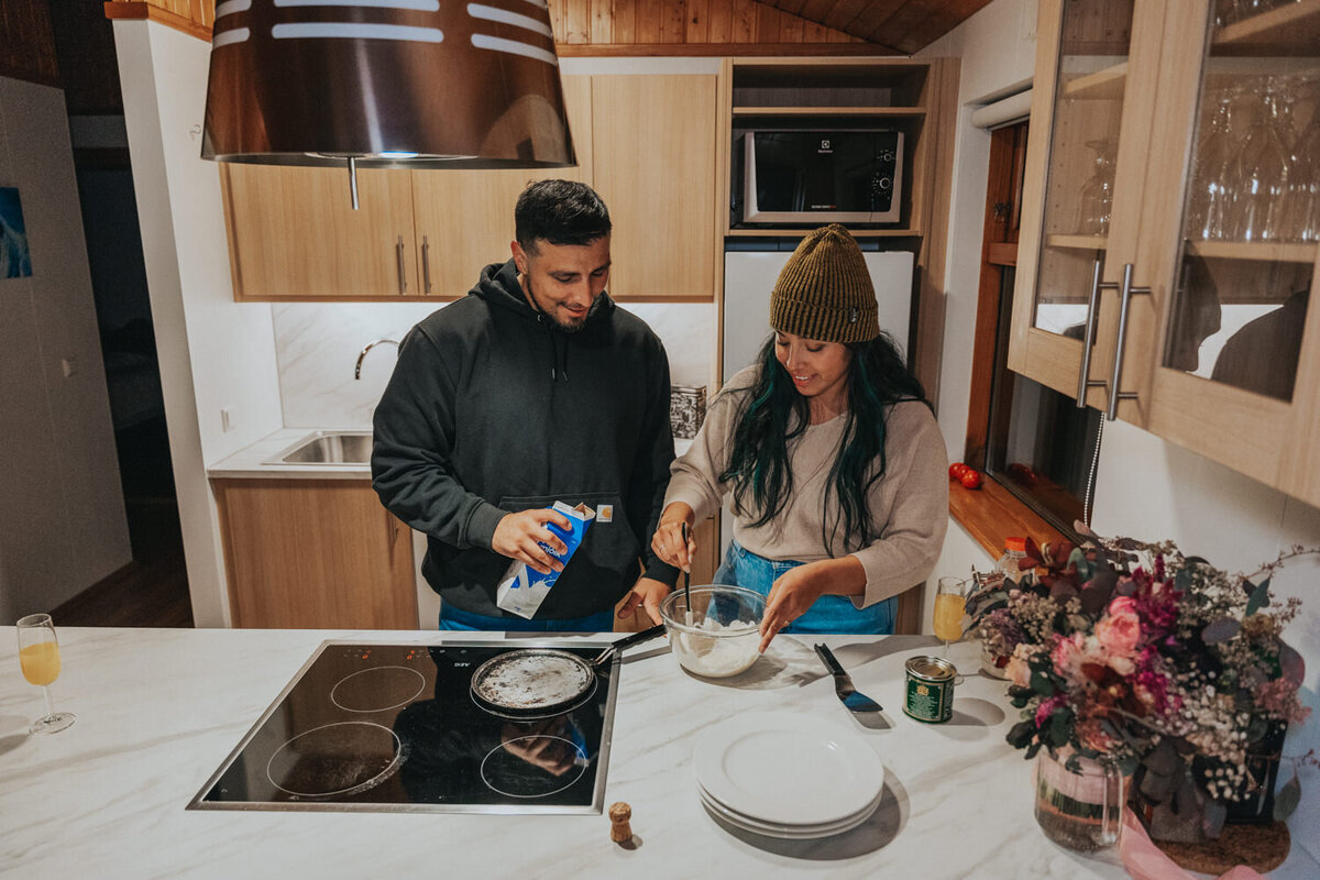 Newlyweds bake together in their kitchenette 