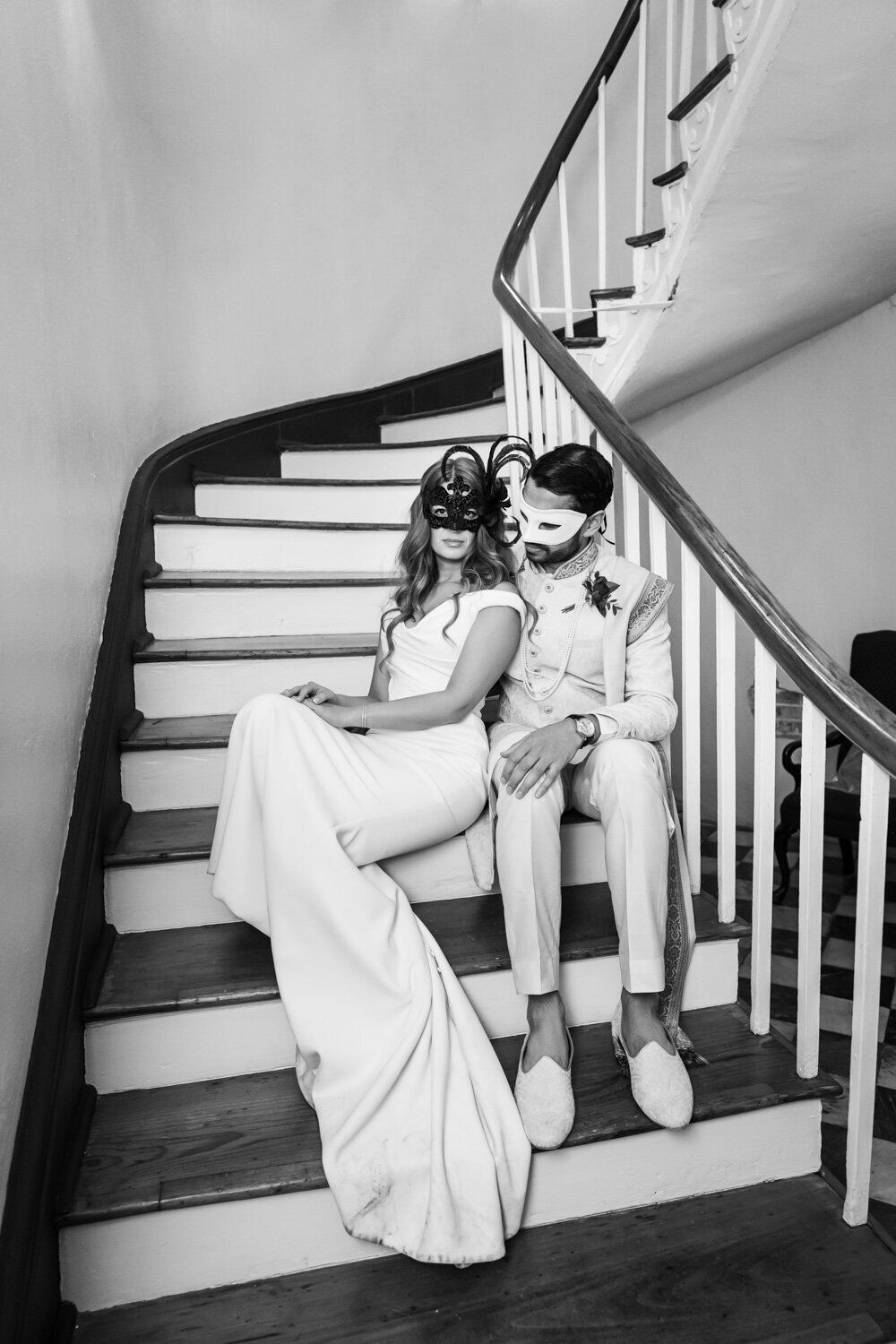 Bride and groom sitting on Latrobe's stairs