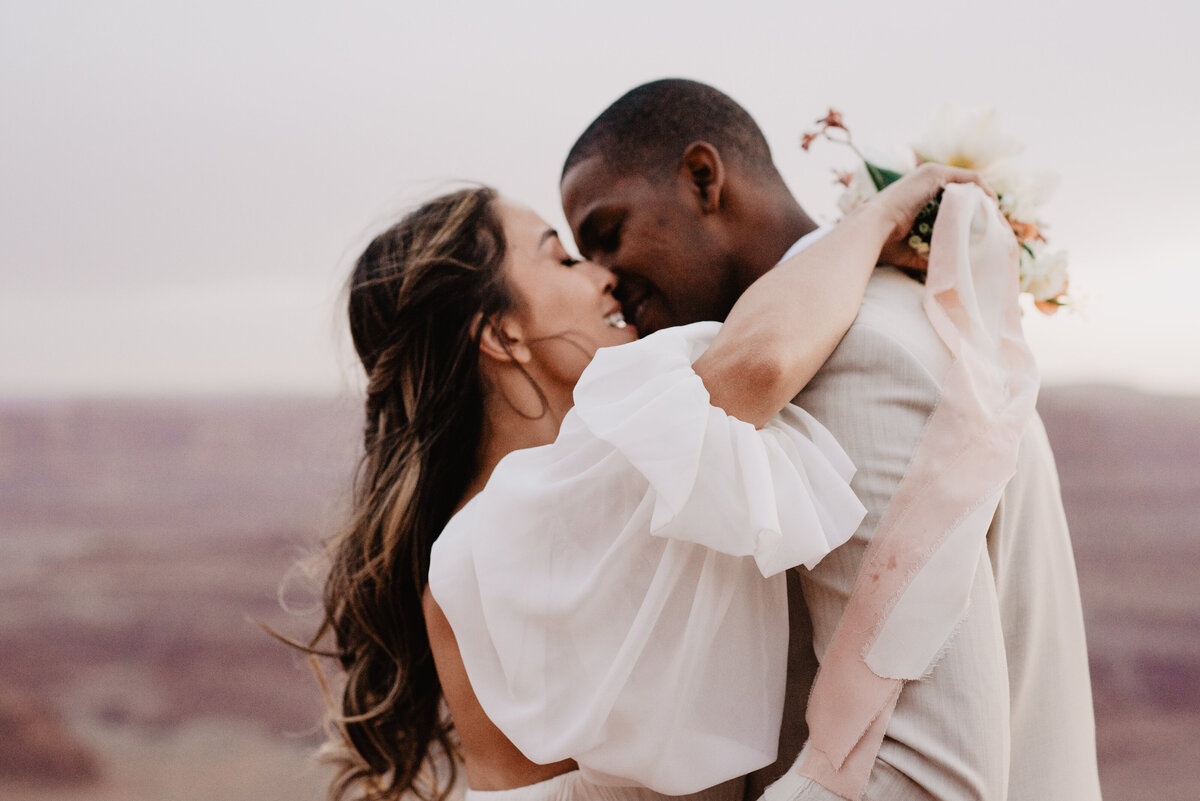 Utah Elopement Photographer captures couple hugging during bridal portraits
