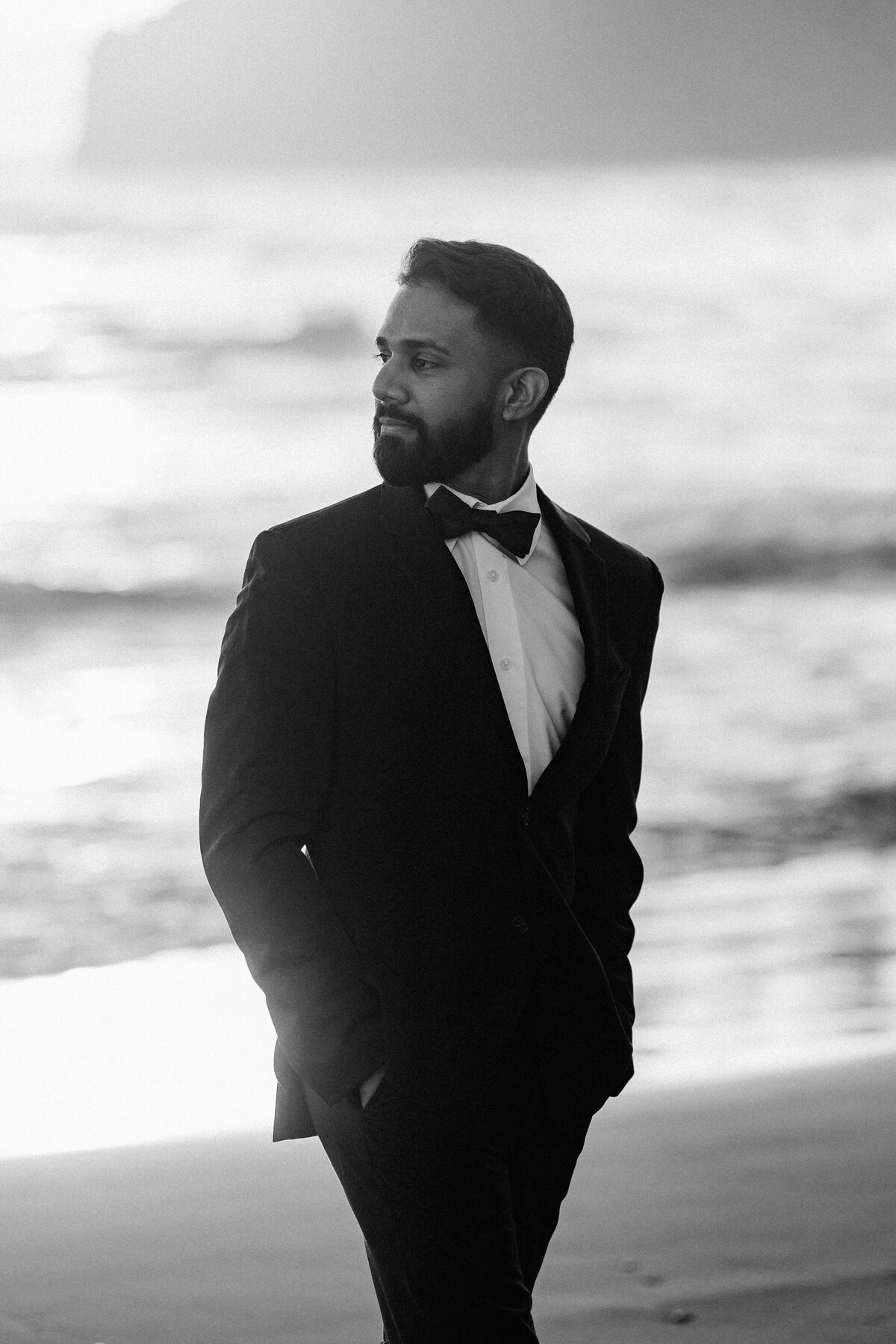 Groom sunset beach portraits