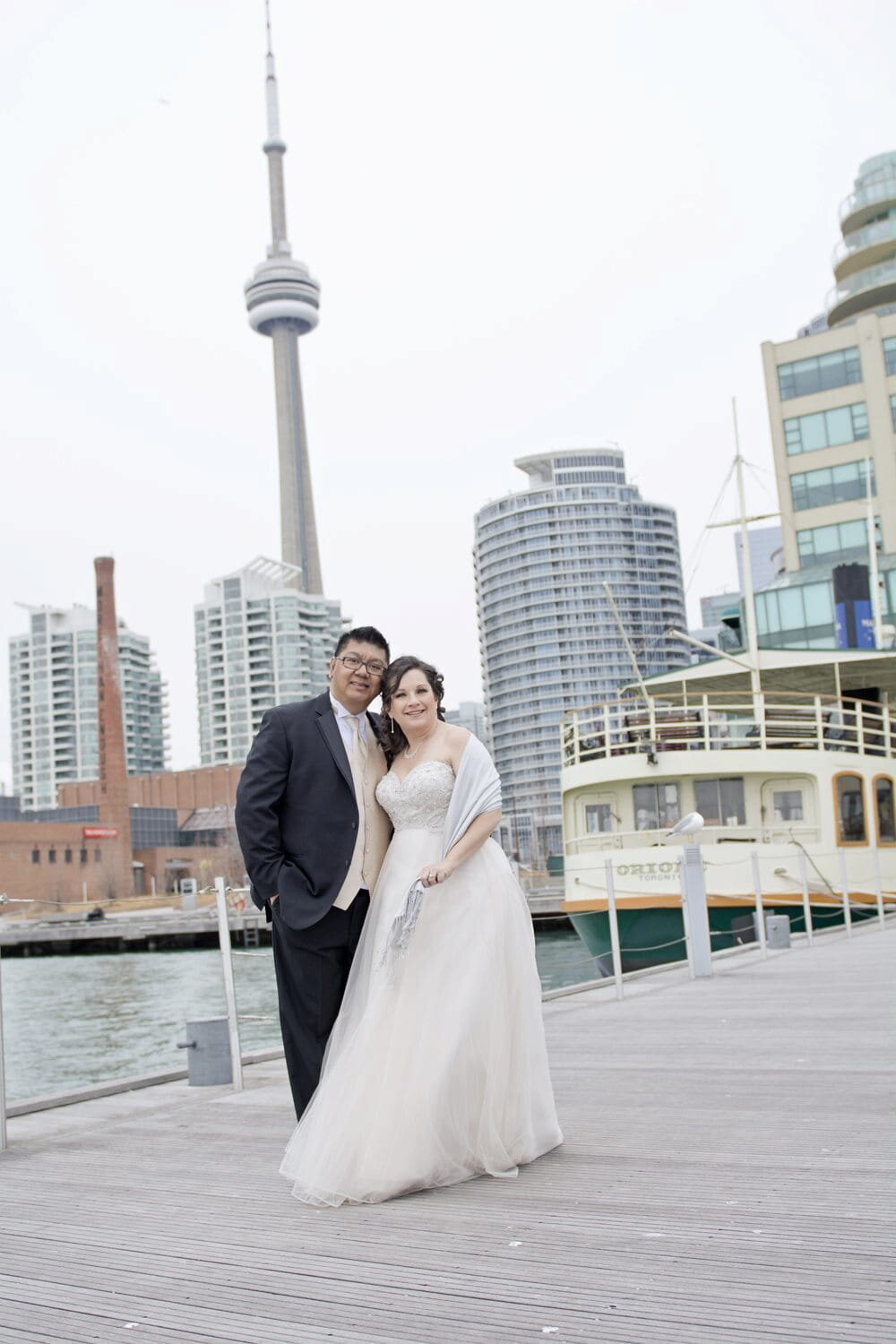 bride-groom-cn-tower-dock-wedding-photo