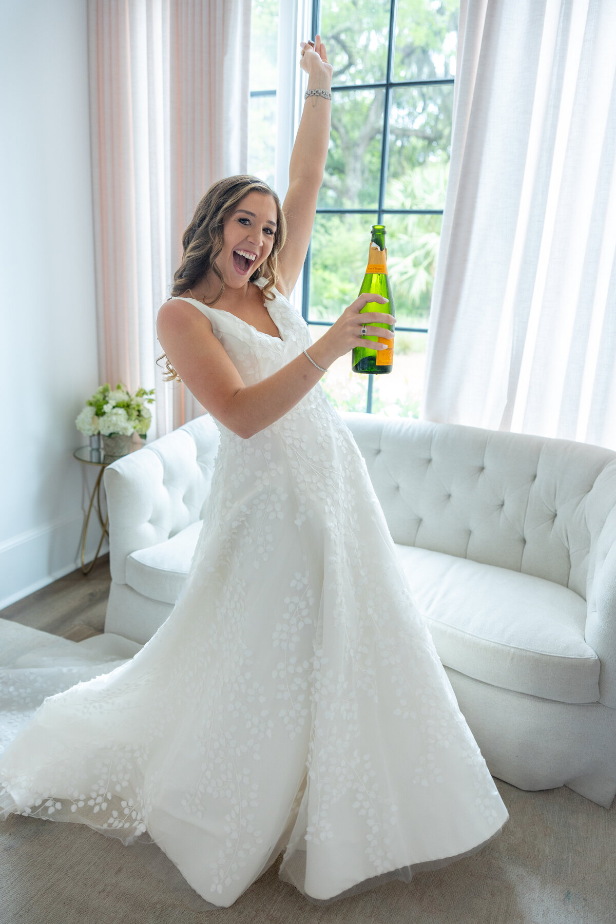 Bride with Champagne Bottle at Forbes Farm St. Simons