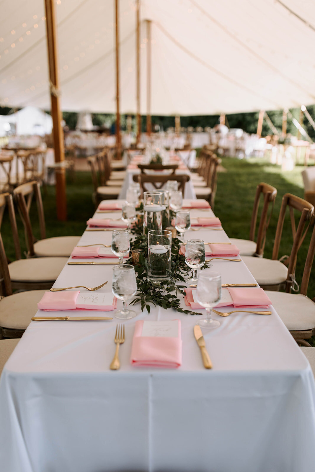 white, blush, and gold tented wedding reception decor in upstate new york