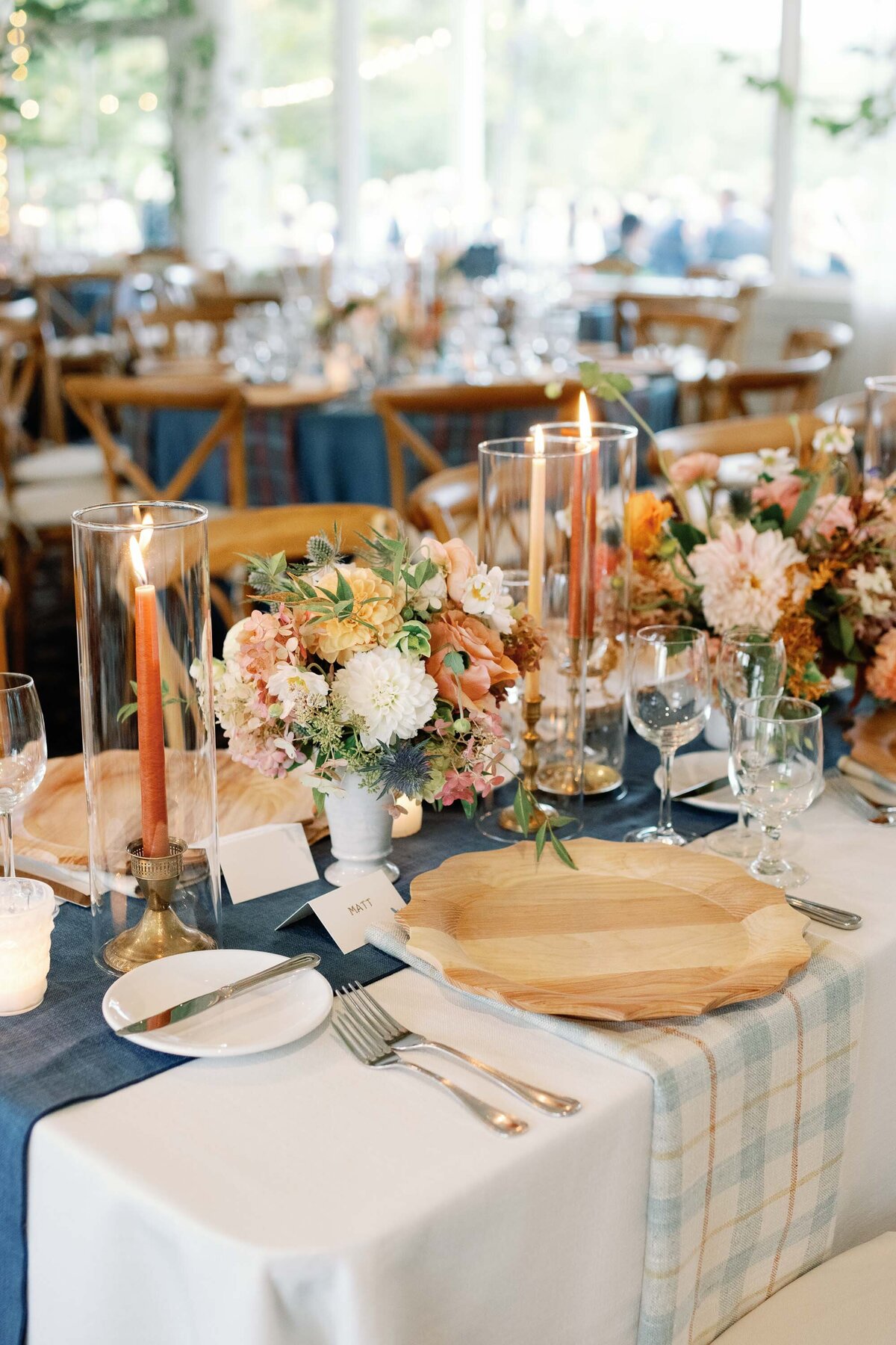 basin harbor club reception detail photo with blue runner across table and wooden plates designed by birds of a flower