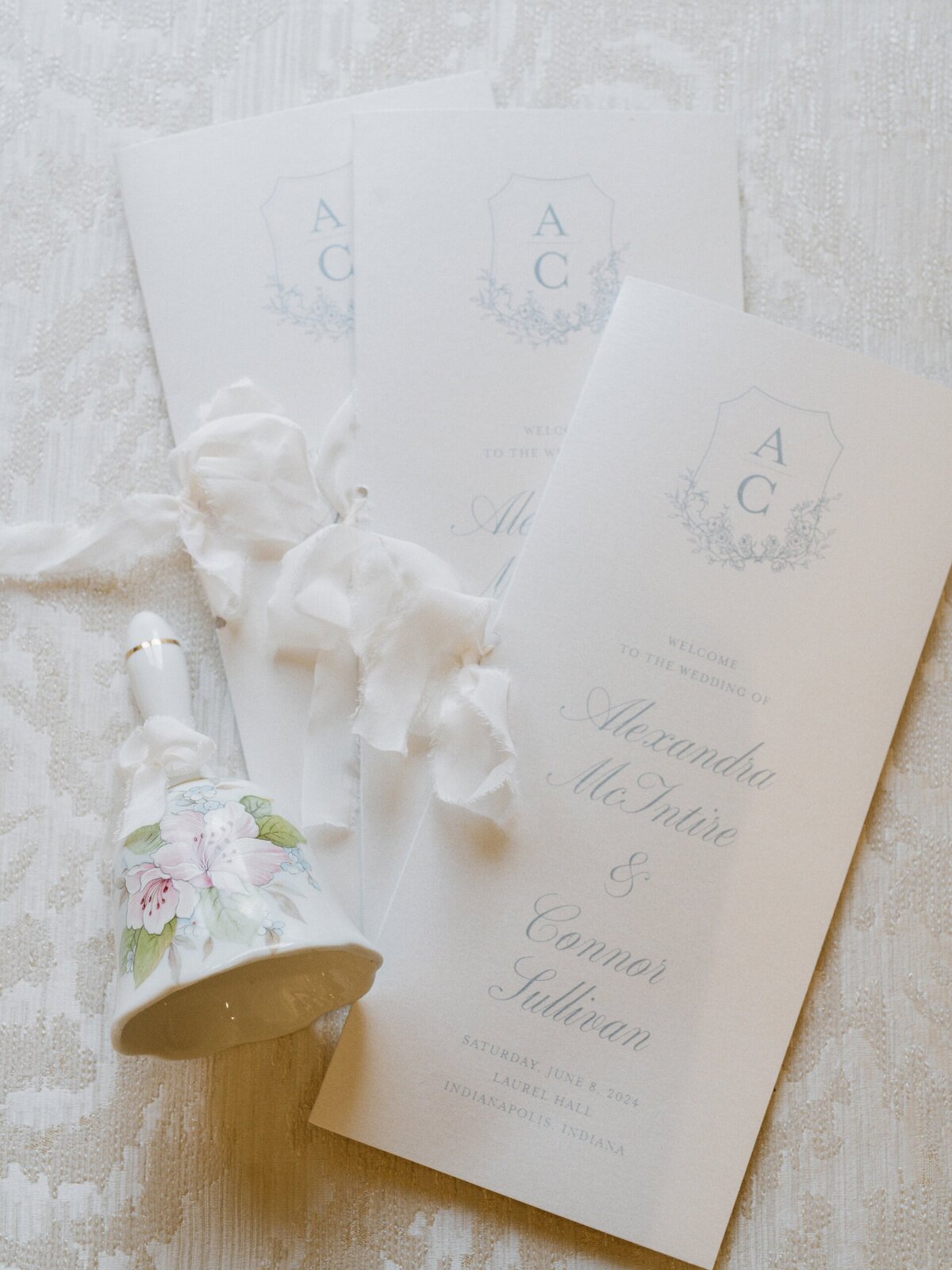 white and blue wedding stationery