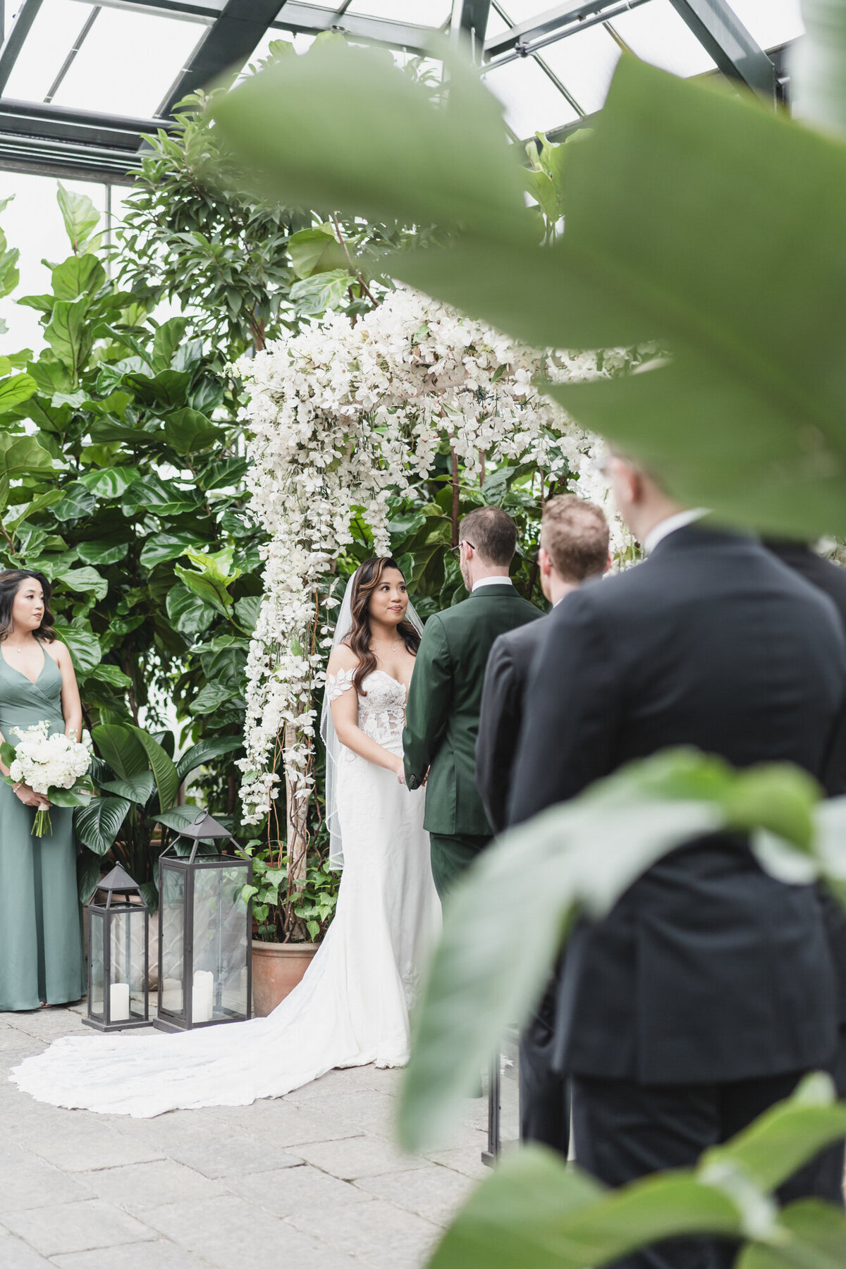 A MAGICAL WINTER PLANTERRA GARDEN WEDDING WITH A GREEN COLOR PALETTE IN WEST BLOOMFIELD, MICHIGAN PROVIDED BY KARI DAWSON PHOTOGRAPHY62