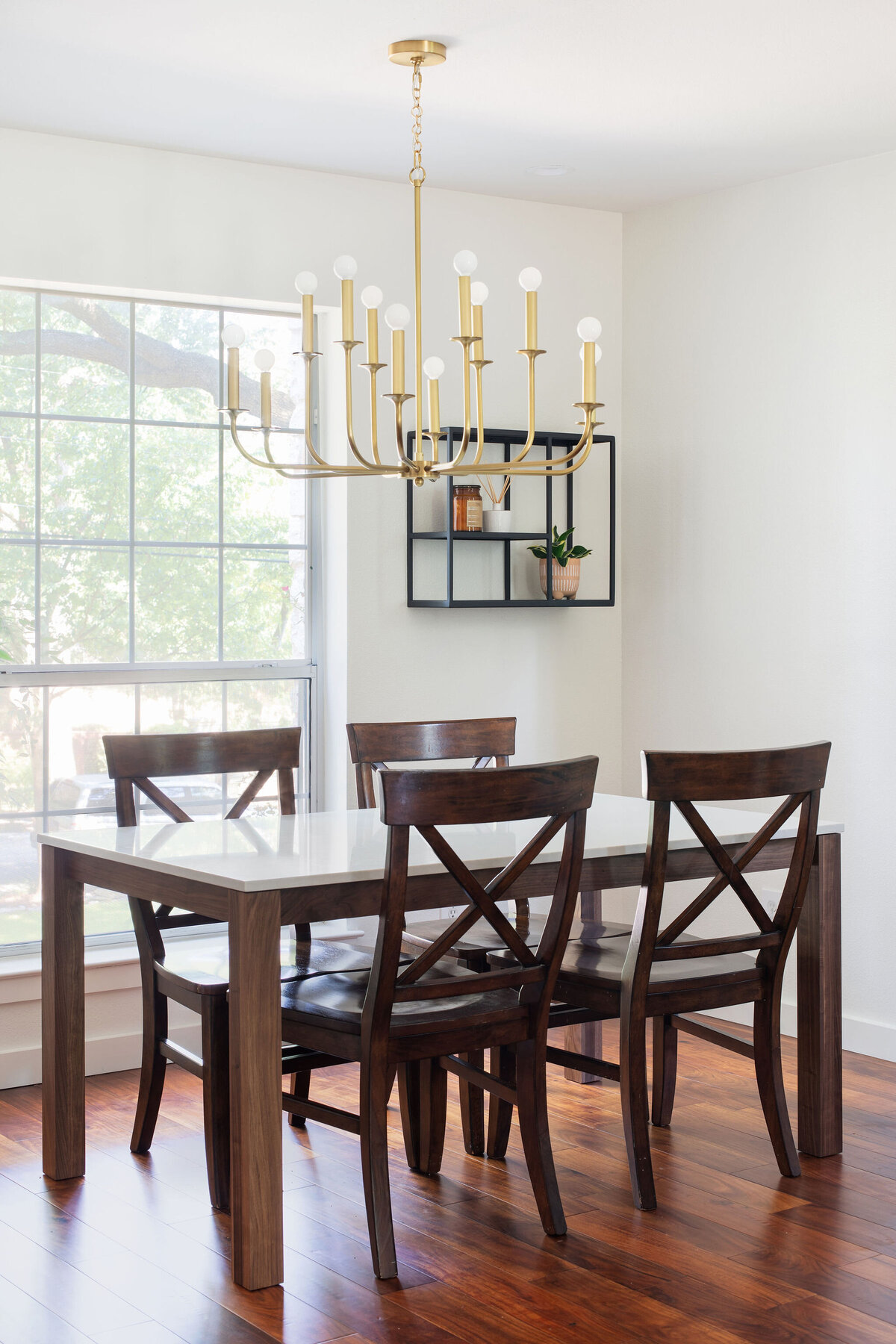 hello-home-wood-dining-table-brass-chandelier-austin-1