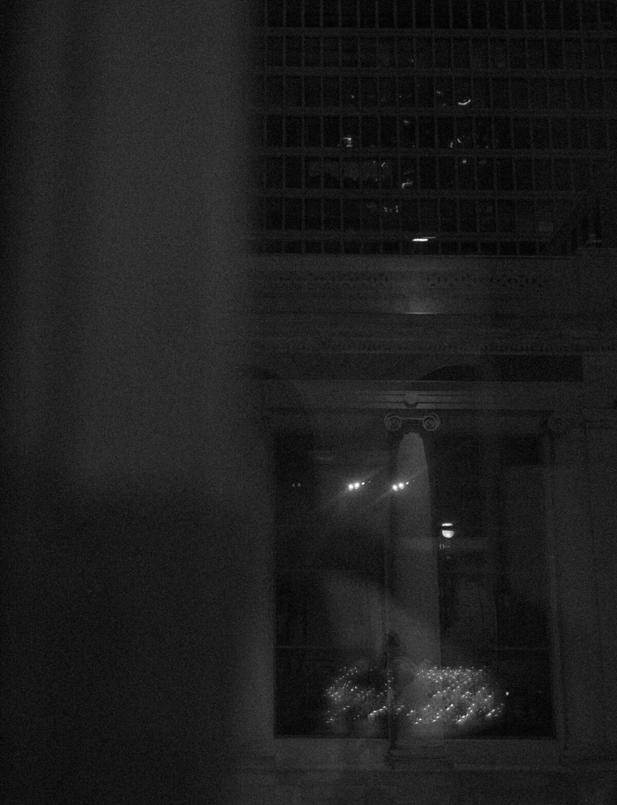 soft abstract wedding detail photo with Detroit architecture & candlelight at night