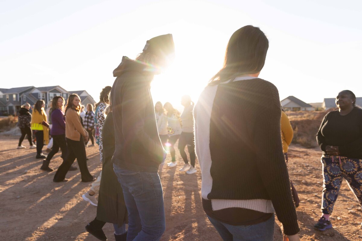 group of people in nature at golden hour
