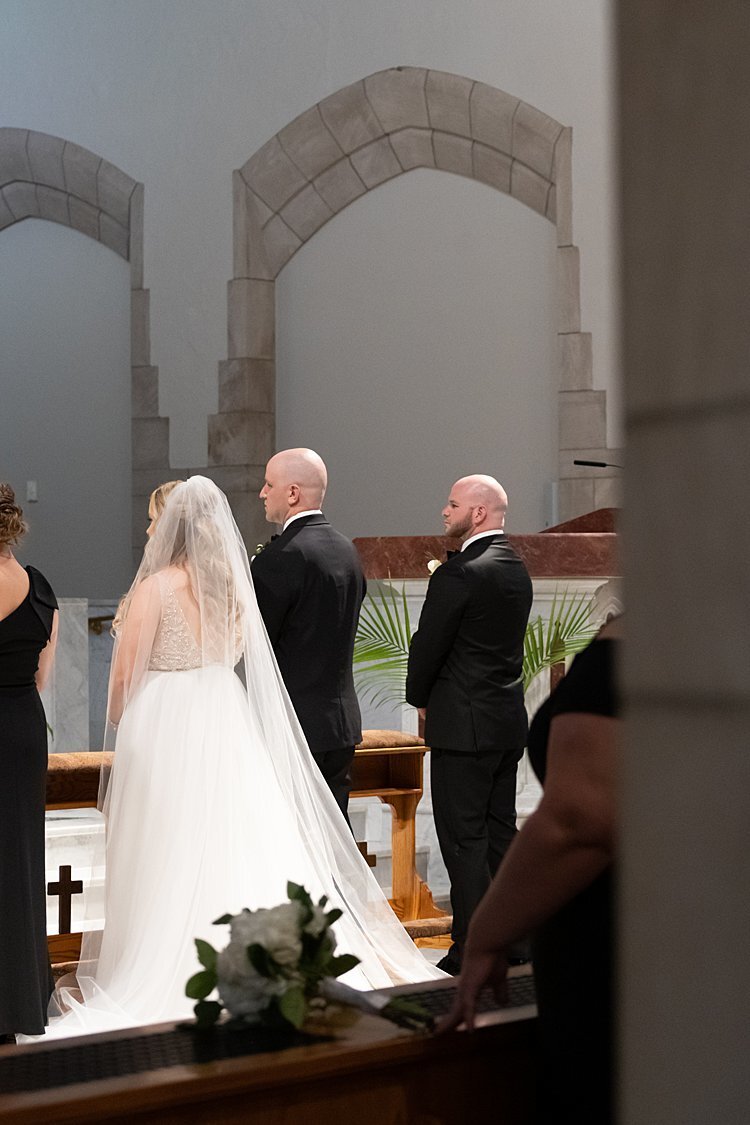 Bride and Groom standing at altar during wedding ceremony at First Presbyterian Church in Beaver, PA