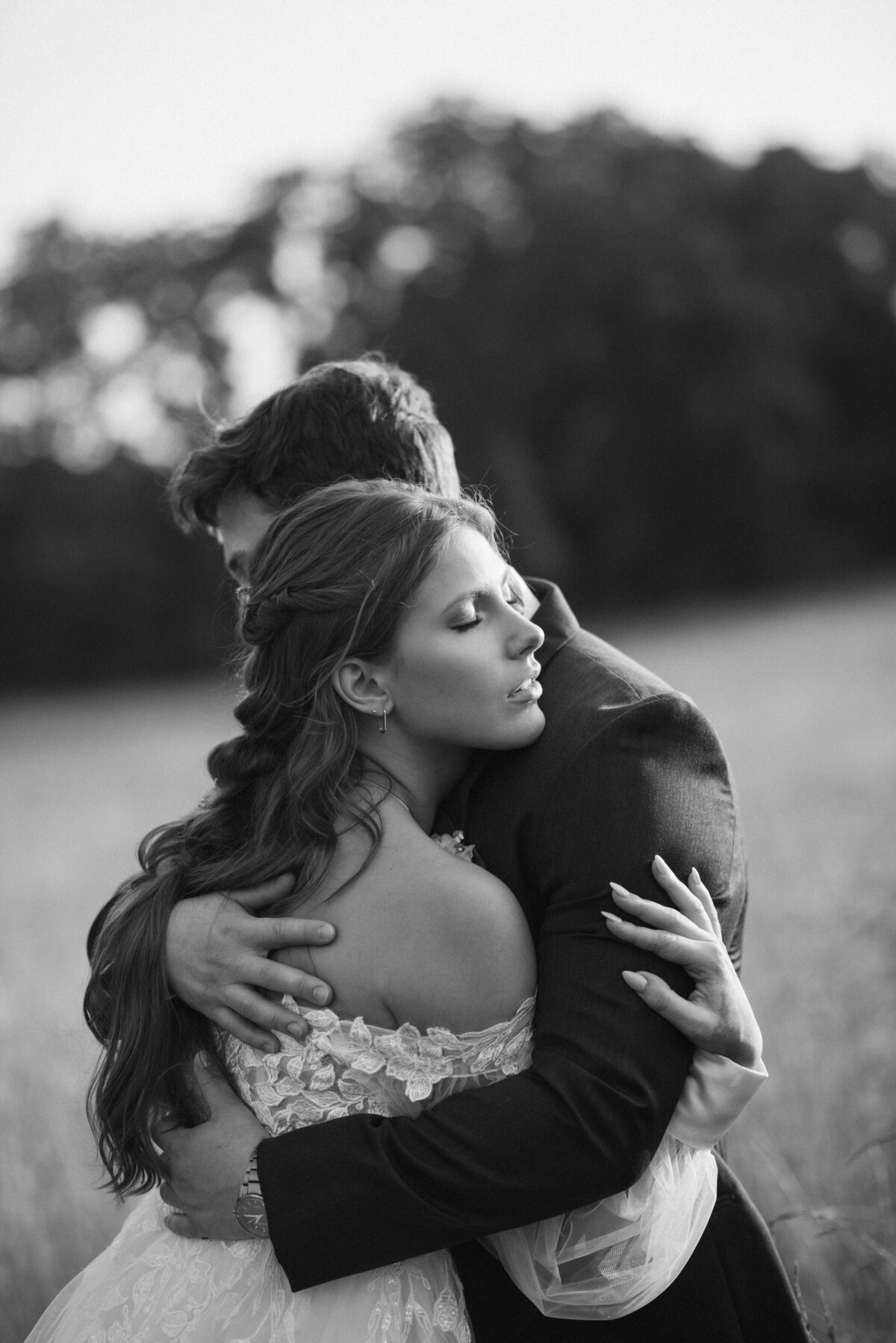 Bride and groom share a quiet hug during their intimate elopement in Pennsylvania