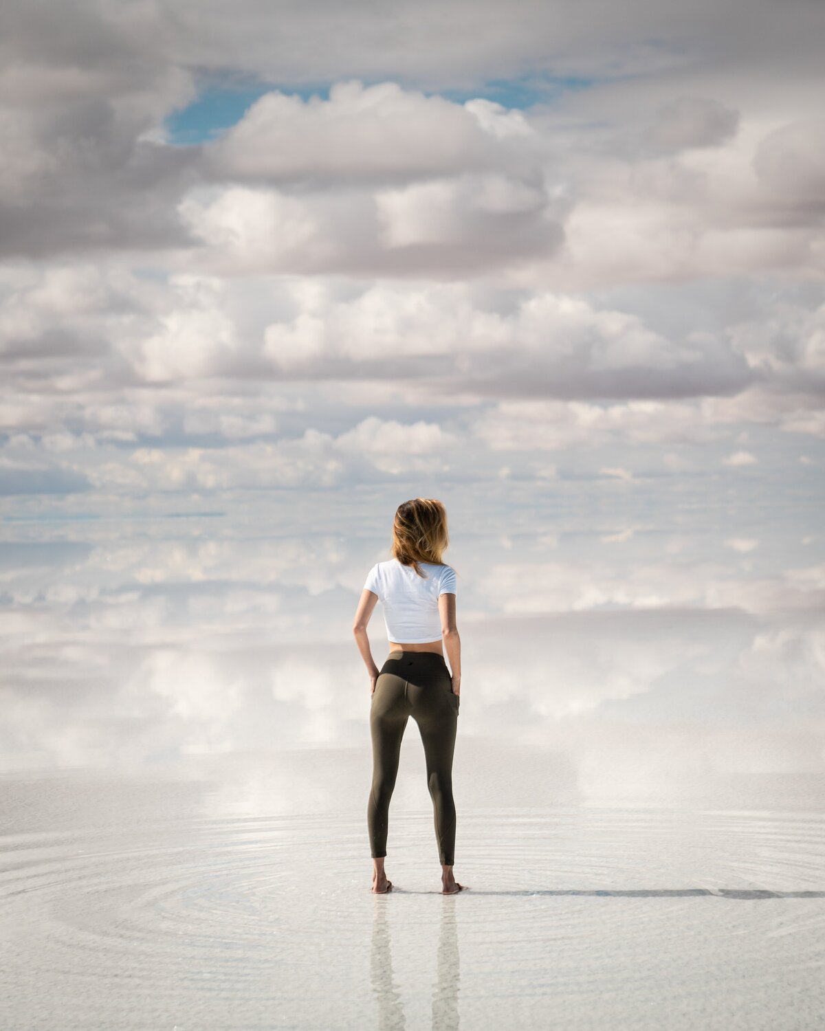 Jess of Jess Wandering wearing Glyder Apparel standing on salt flats