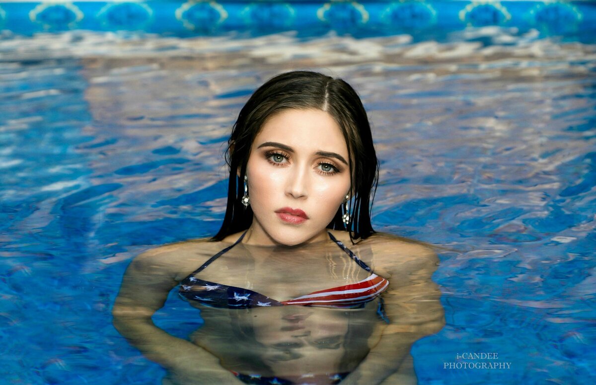 beauty headshot in a swimming pool